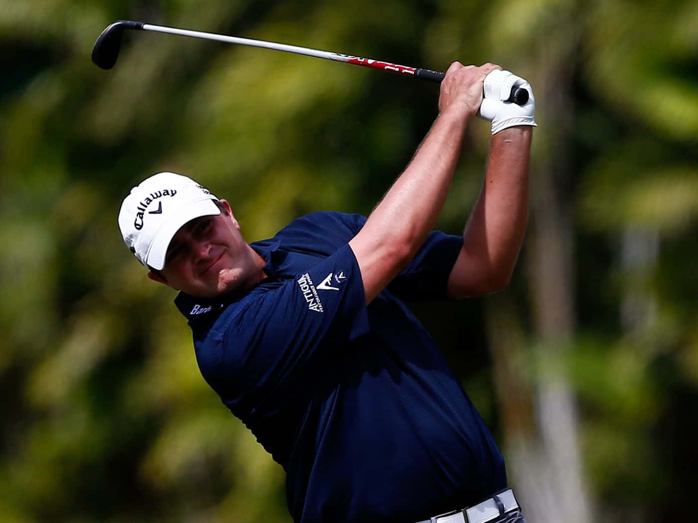 Briny Baird In Action During A Golf Tournament Background