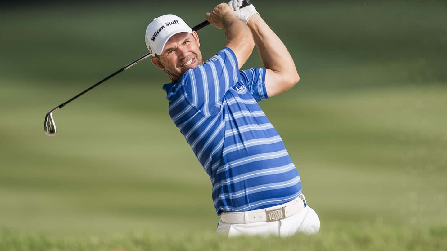 Briny Baird Showing His Golf Mastery On The Course Background