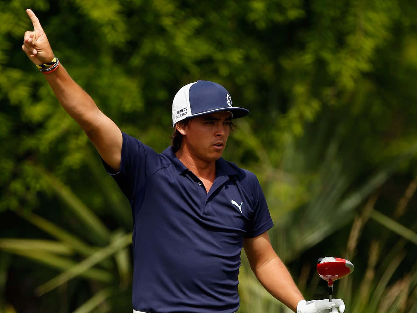 Briny Baird Showing His Perfect Golf Swing Under The Beautiful Sky Background