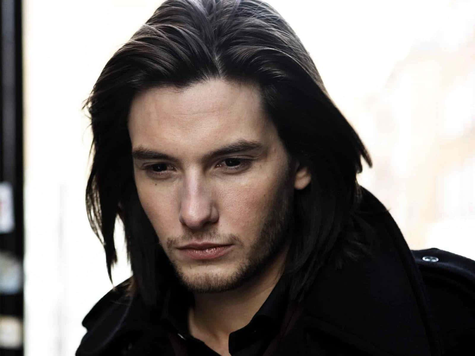 British Actor Ben Barnes In An Artistic Black And White Portrait. Background