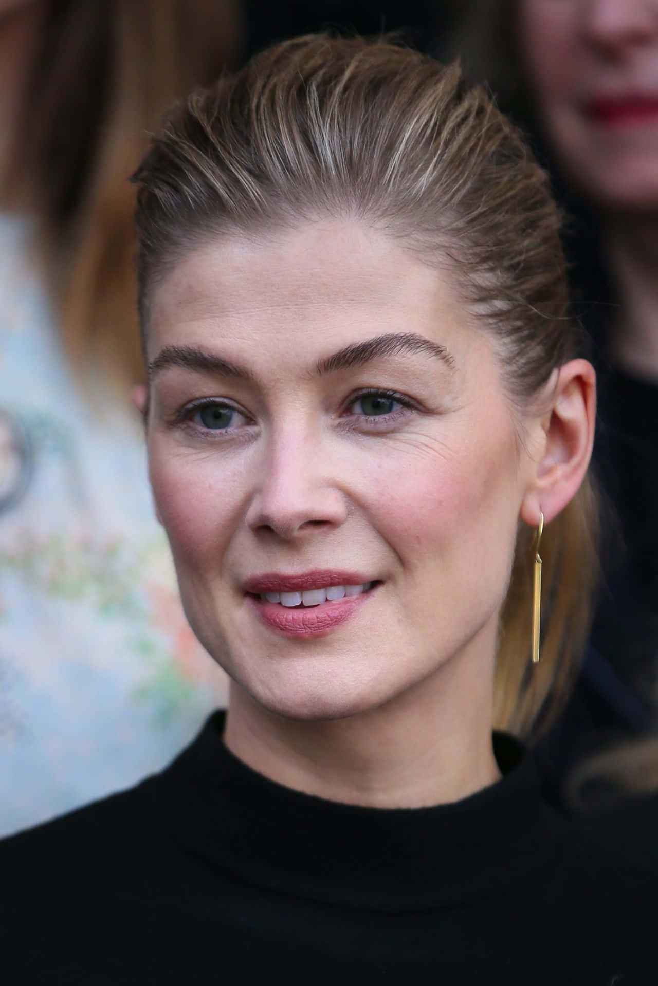 British Actress Rosamund Pike In Elegance Background