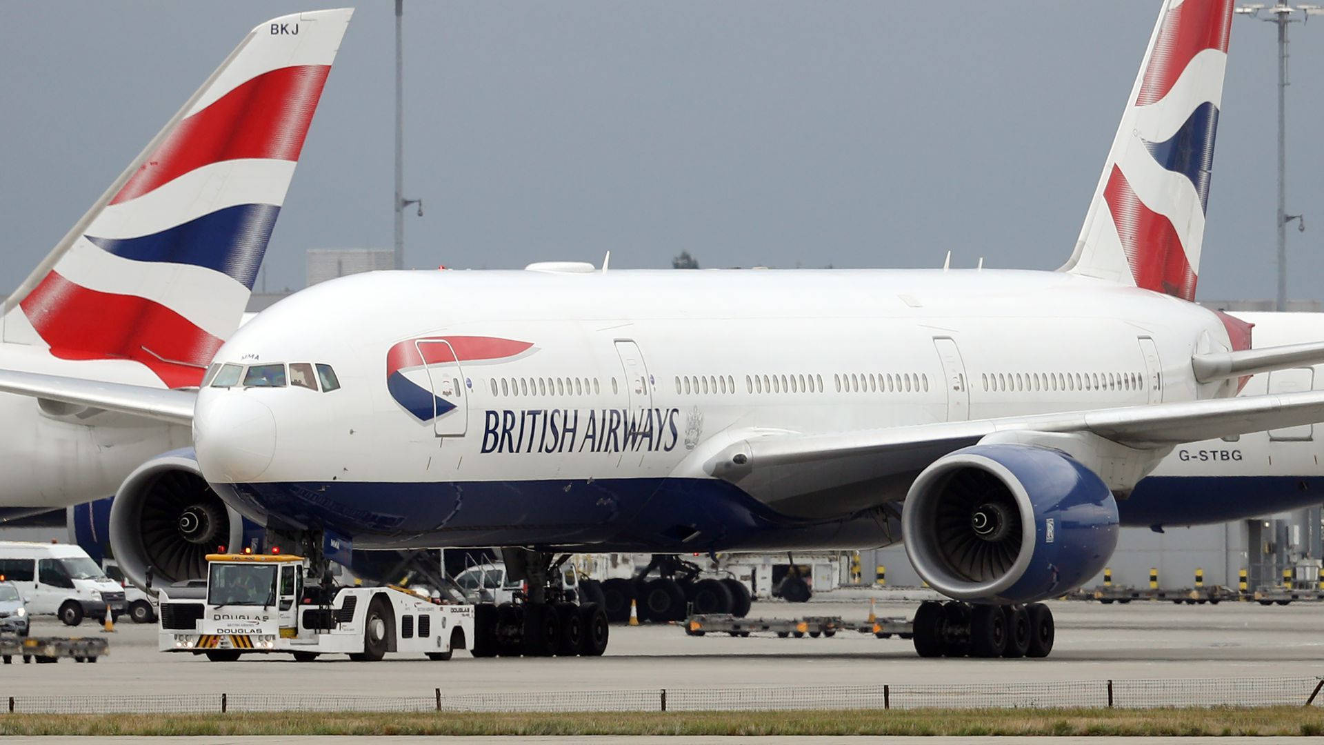 British Airways G Stbg Boeing 777 On Runway Background