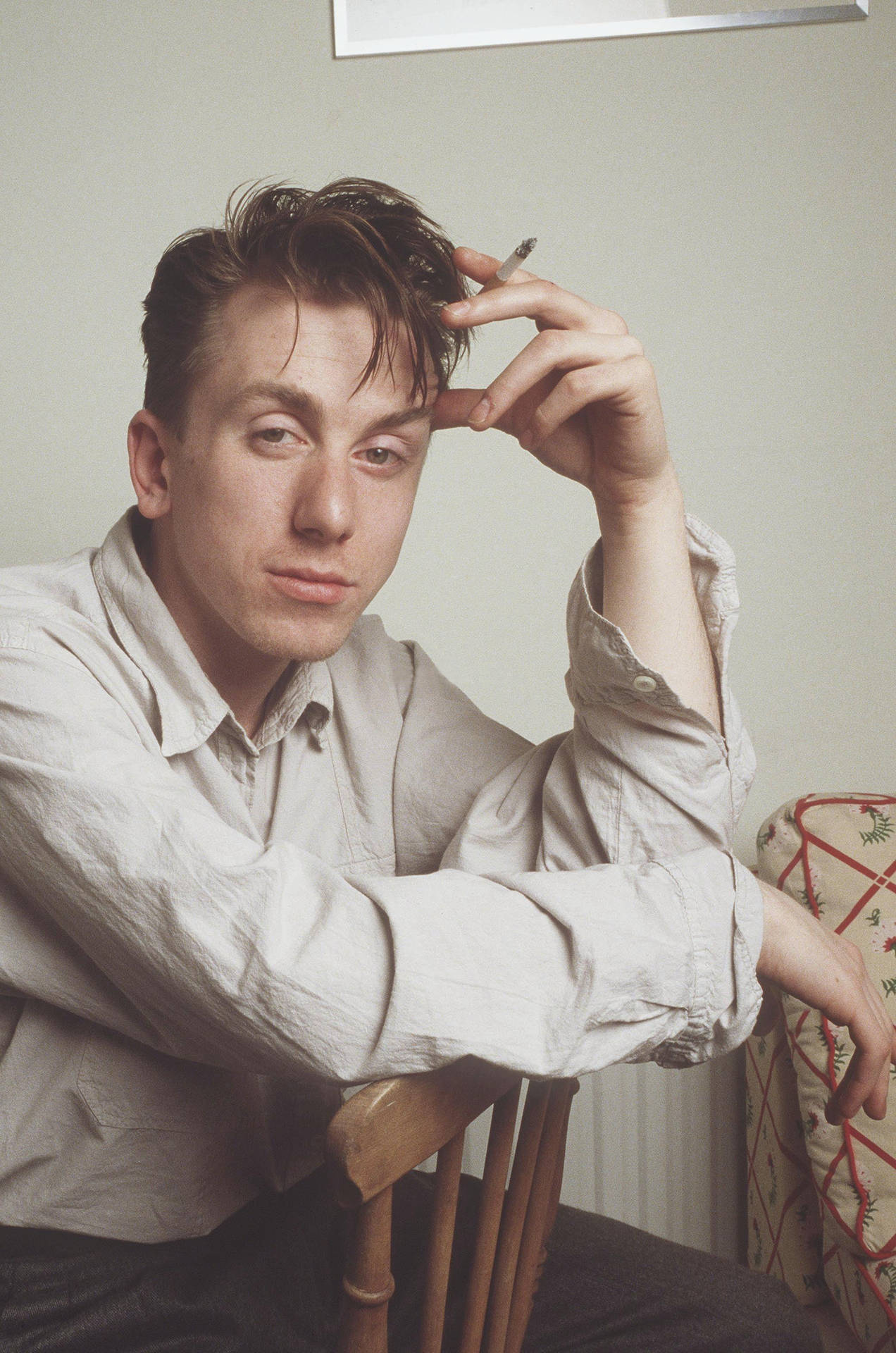 British Talent: A Portrait Of Young Tim Roth Smoking On Chair Background