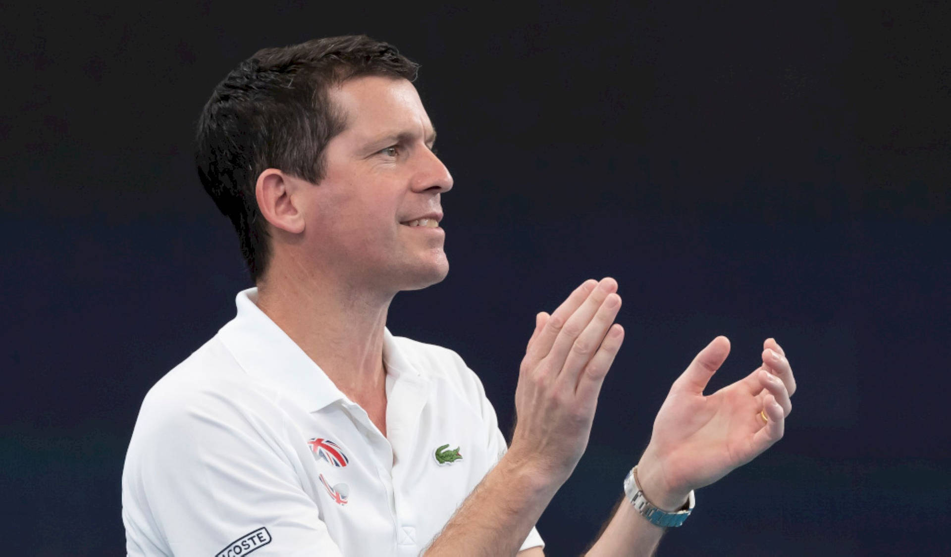 British Tennis Legend Tim Henman Captivating The Crowd Background