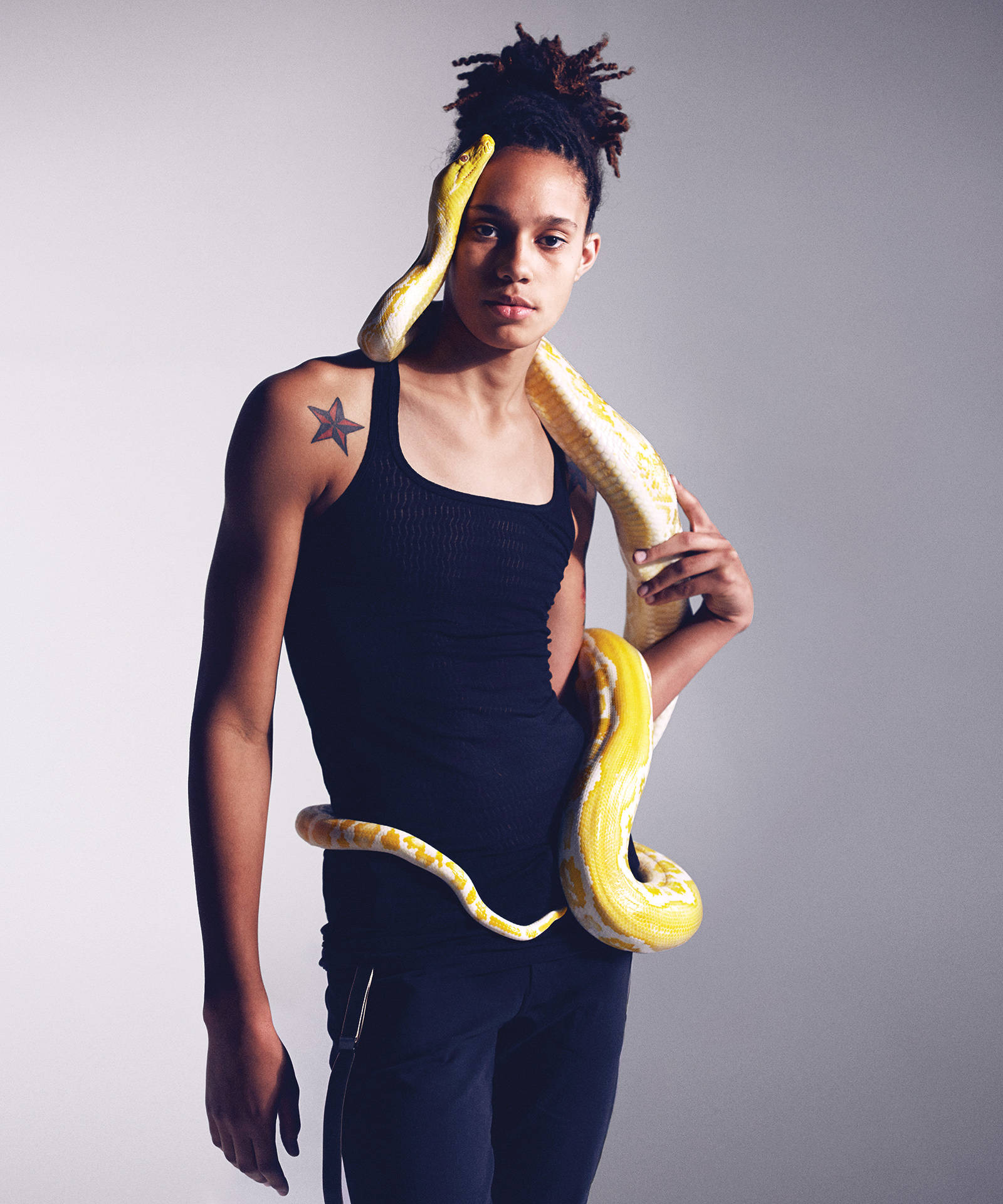 Brittney Griner Holding Snake Background