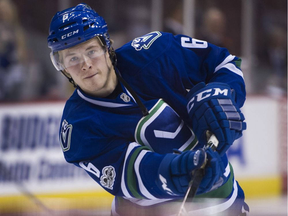 Brock Boeser Vancouver Canucks Hitting Goal Background