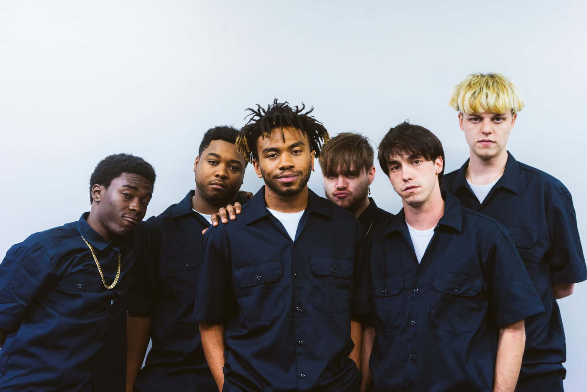Brockhampton Band Members Posing Together In A Group Photo Background