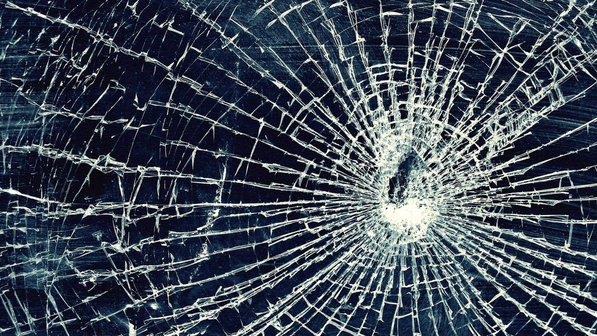 Broken Glass Cracks Screen Saver Background