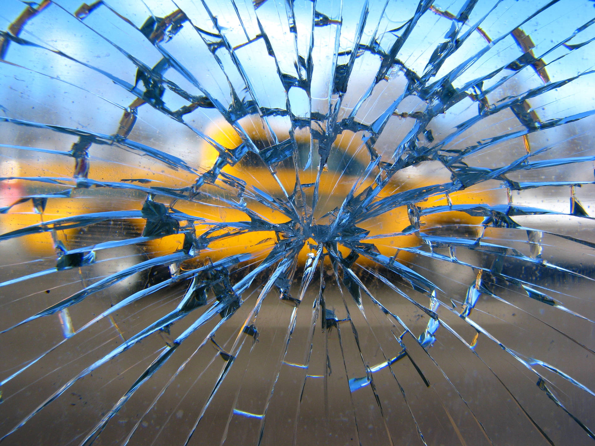 Broken Glass Window Overlooking Automobile Background