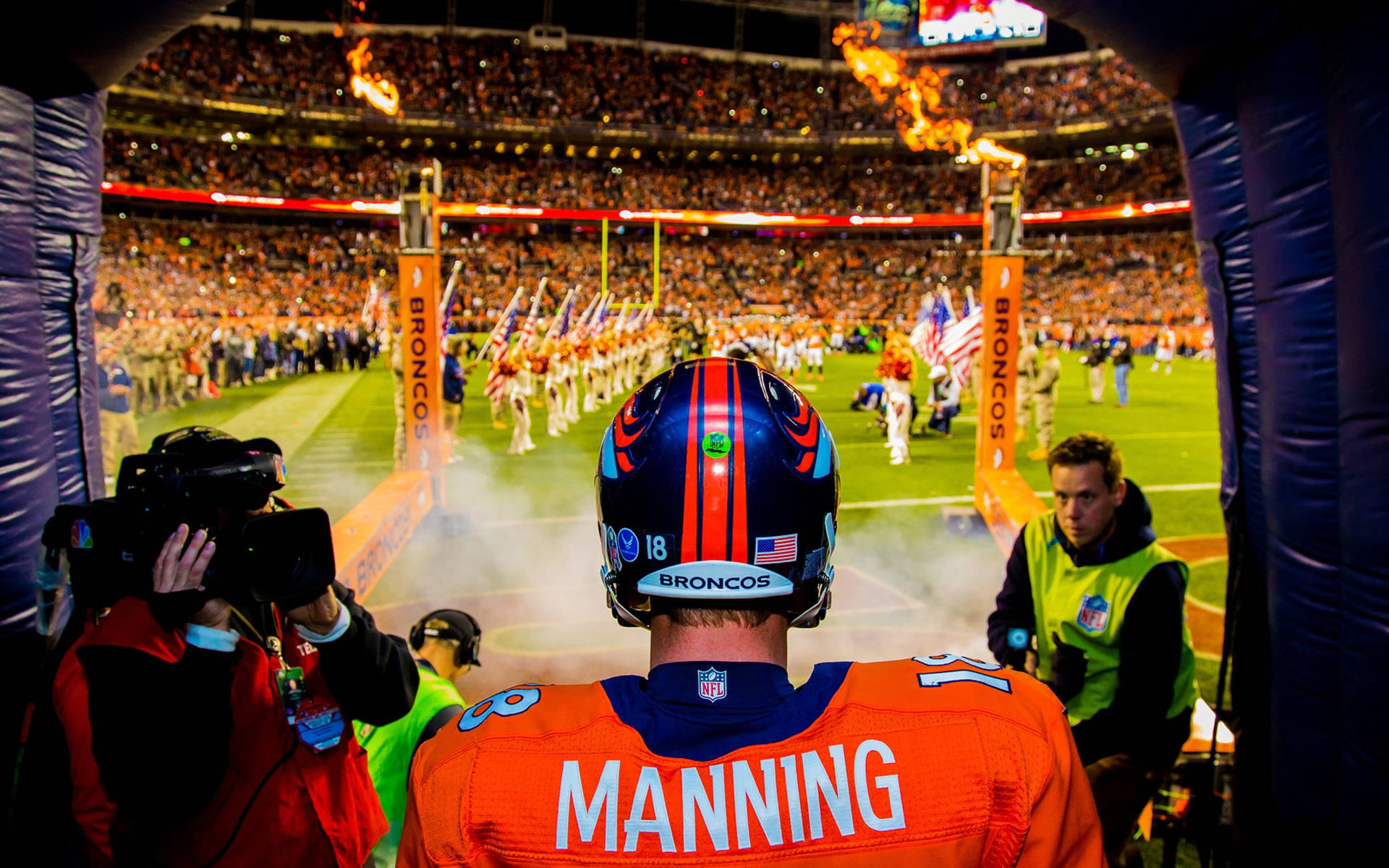 Broncos Manning Walking Into Stadium Background