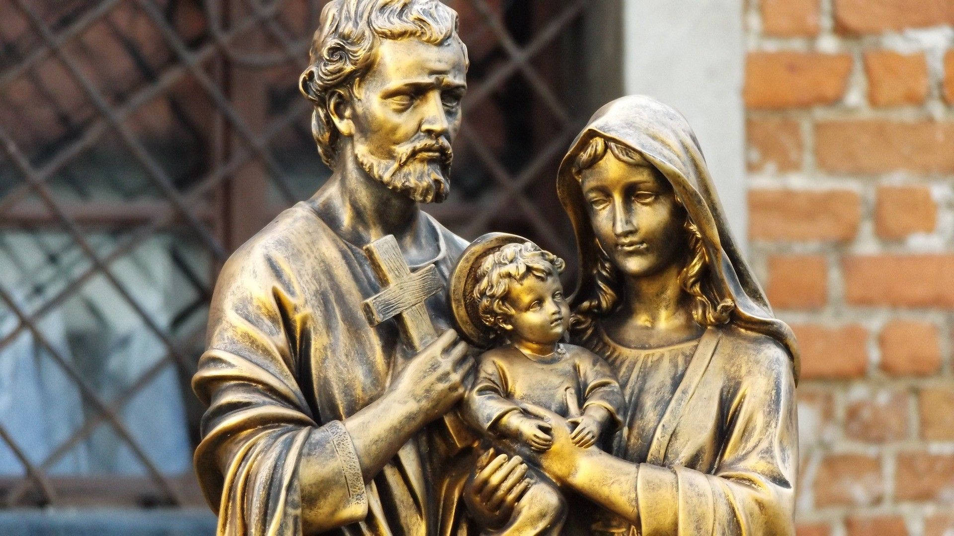 Bronze Statue Of The Holy Family Background