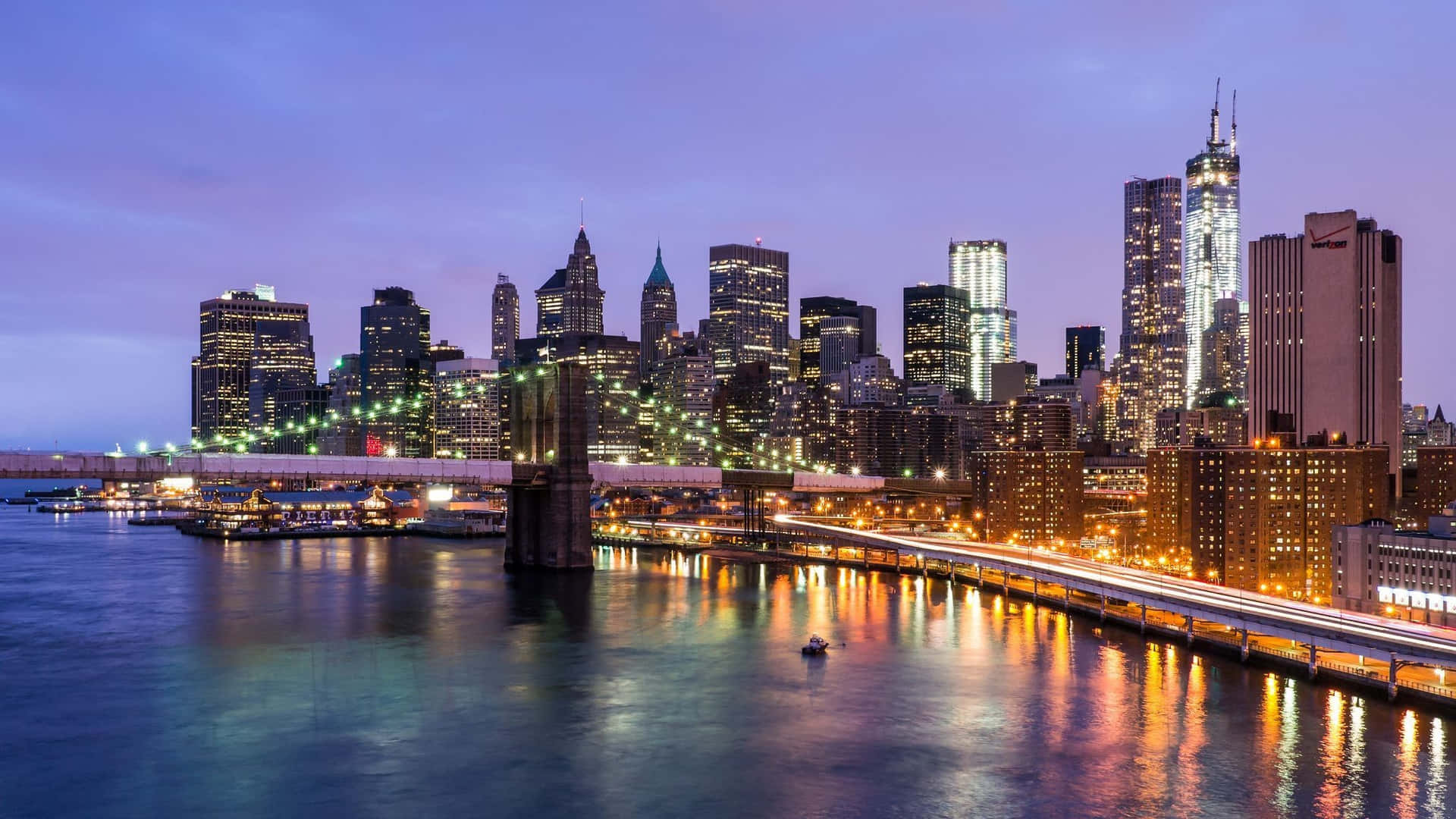 Brooklyn Bridge And City Skyline At Dusk Background