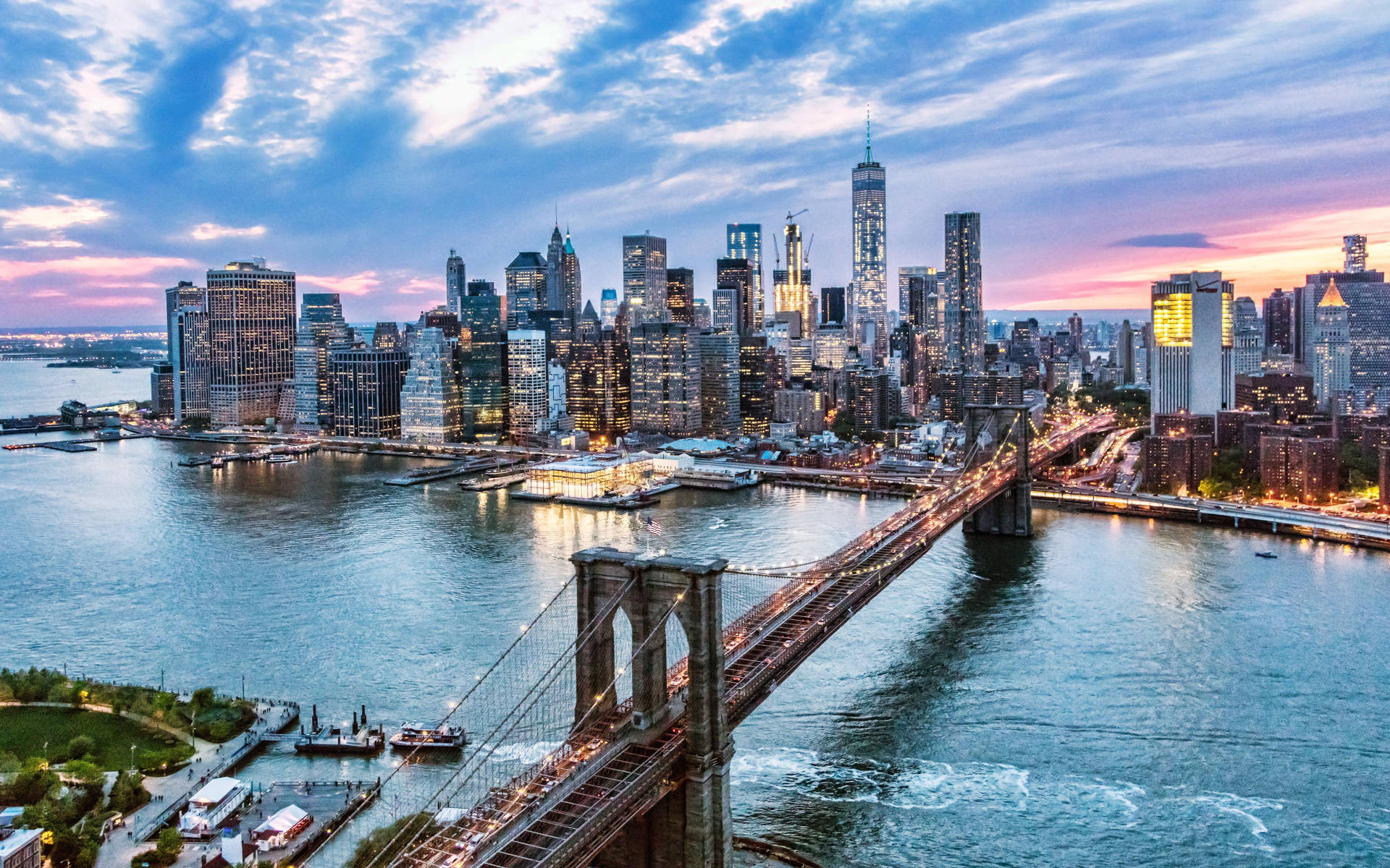 Brooklyn Bridge, East River, And New York Skyline Background