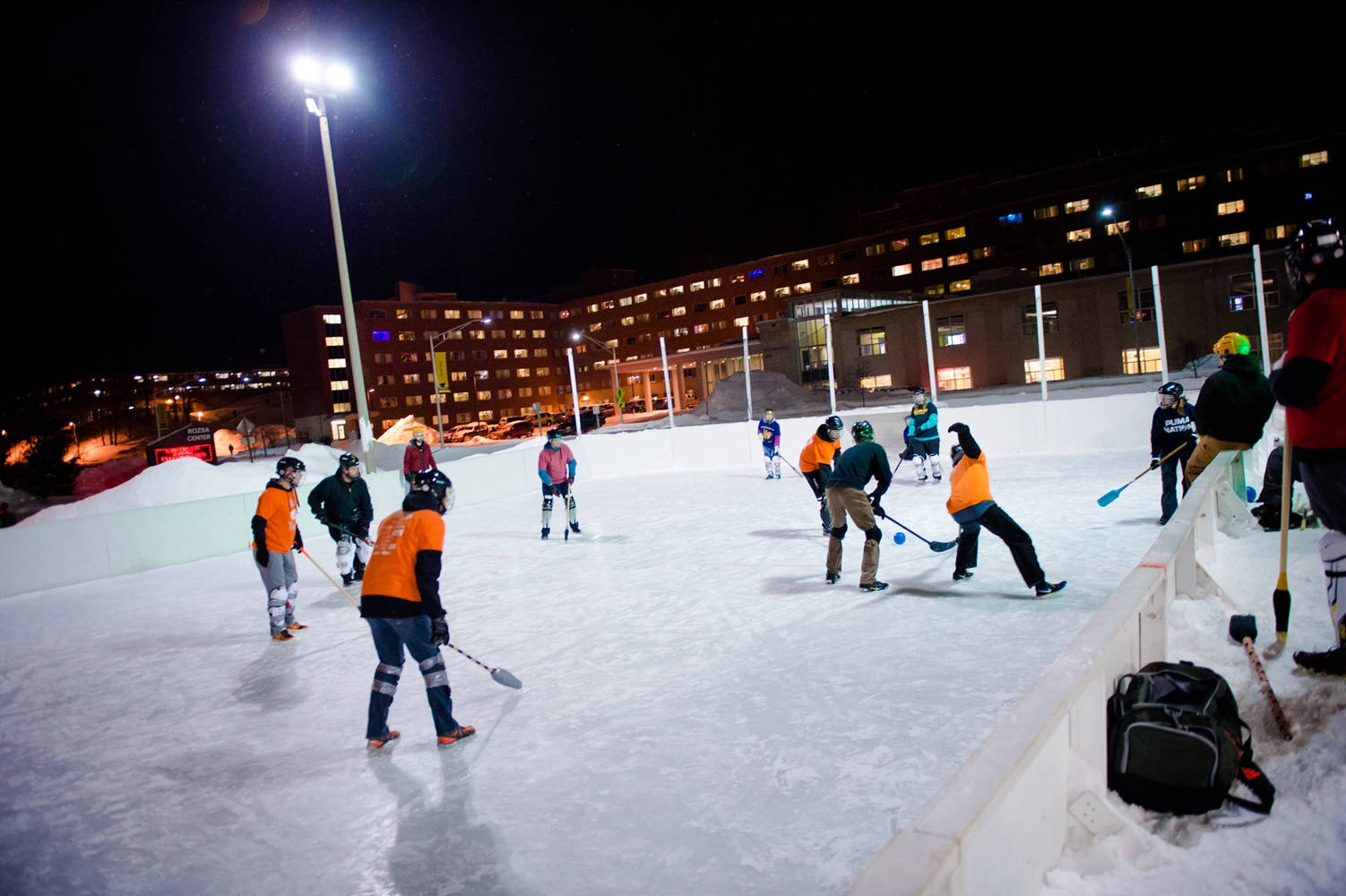 Broomball Sports Orange And Black Team Background