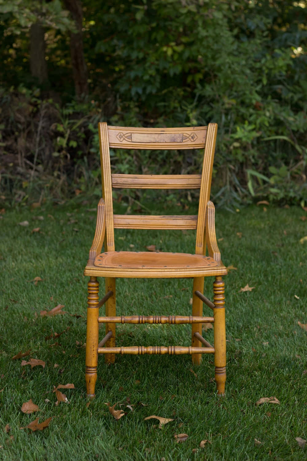 Brown Wooden Chair On Grass