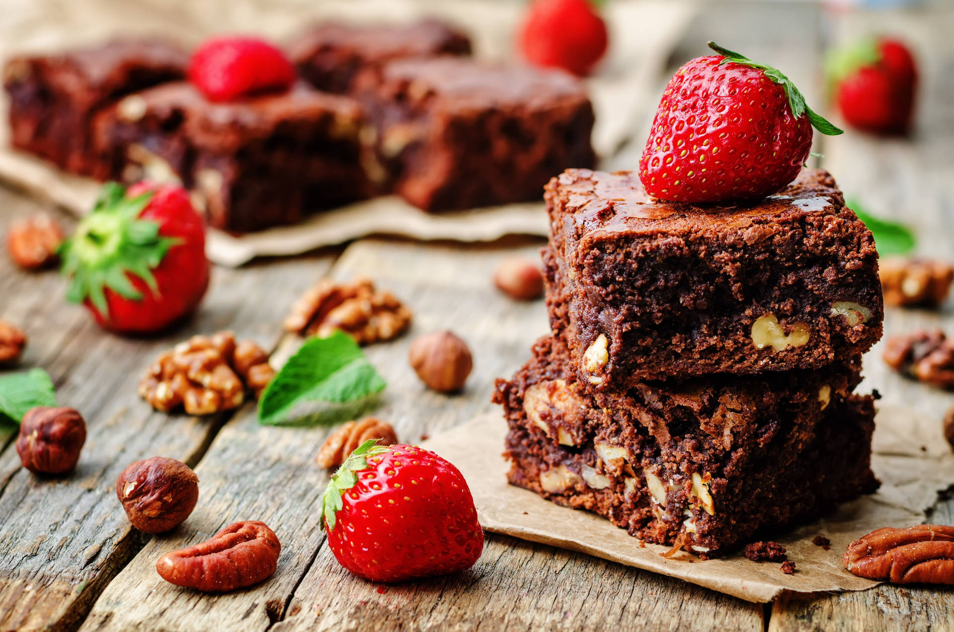 Brownies With Nuts And Strawberries Background