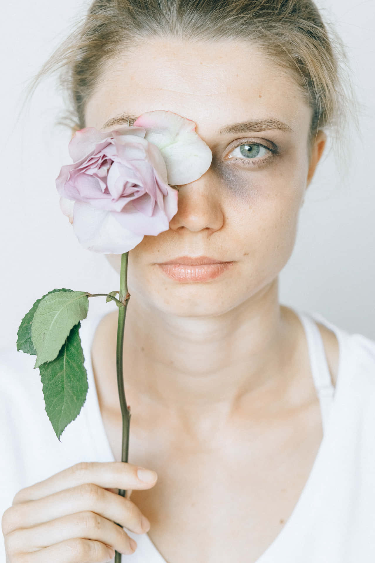Bruised Girl Holding Rose