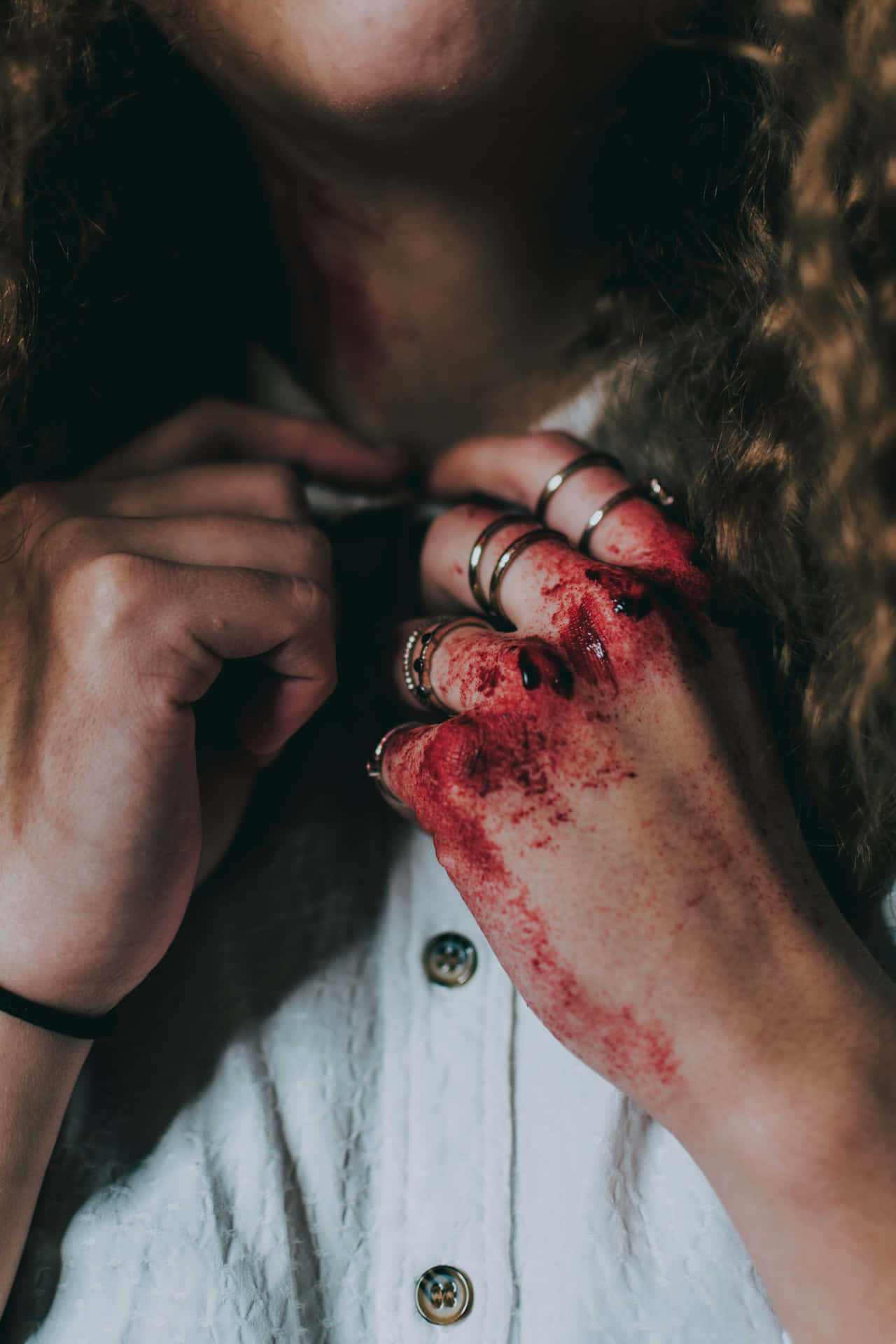 Bruised Knuckles Buttoning Shirt Background