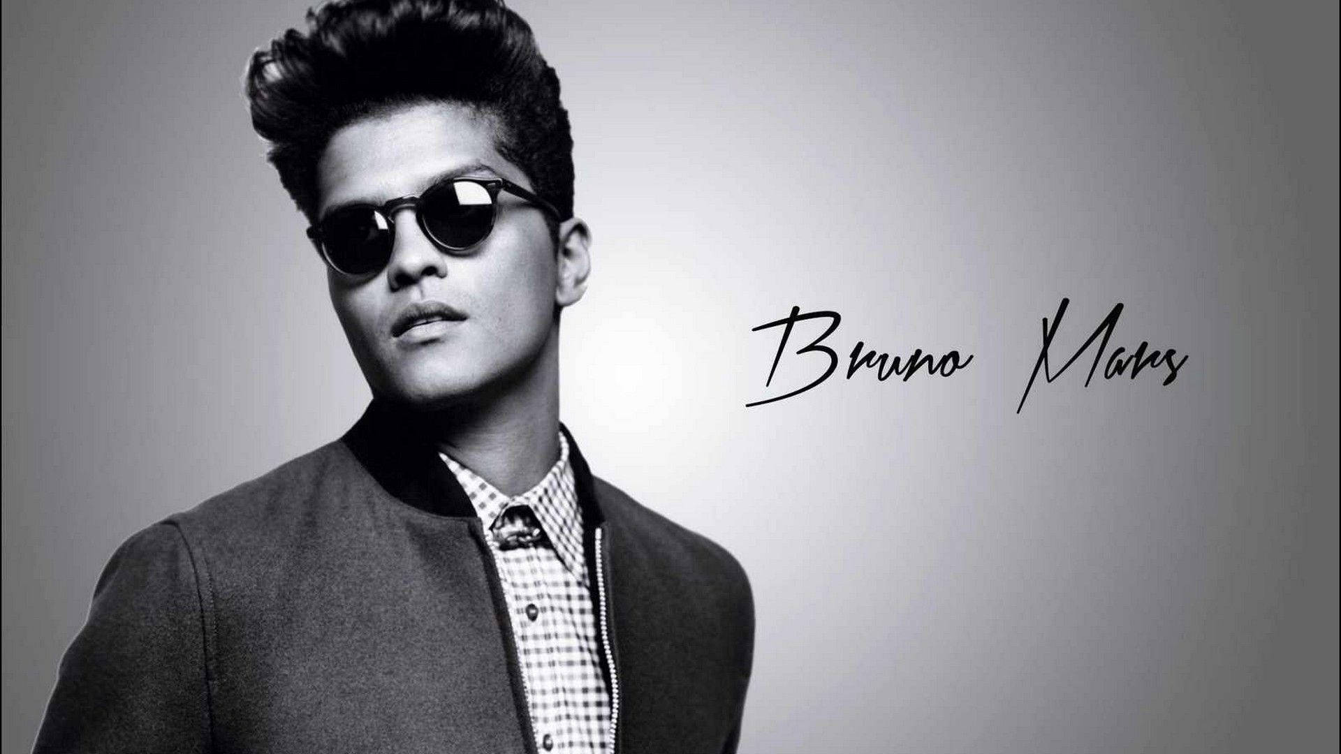 Bruno Mars All Dressed Up In An Eye-catching Outfit Background