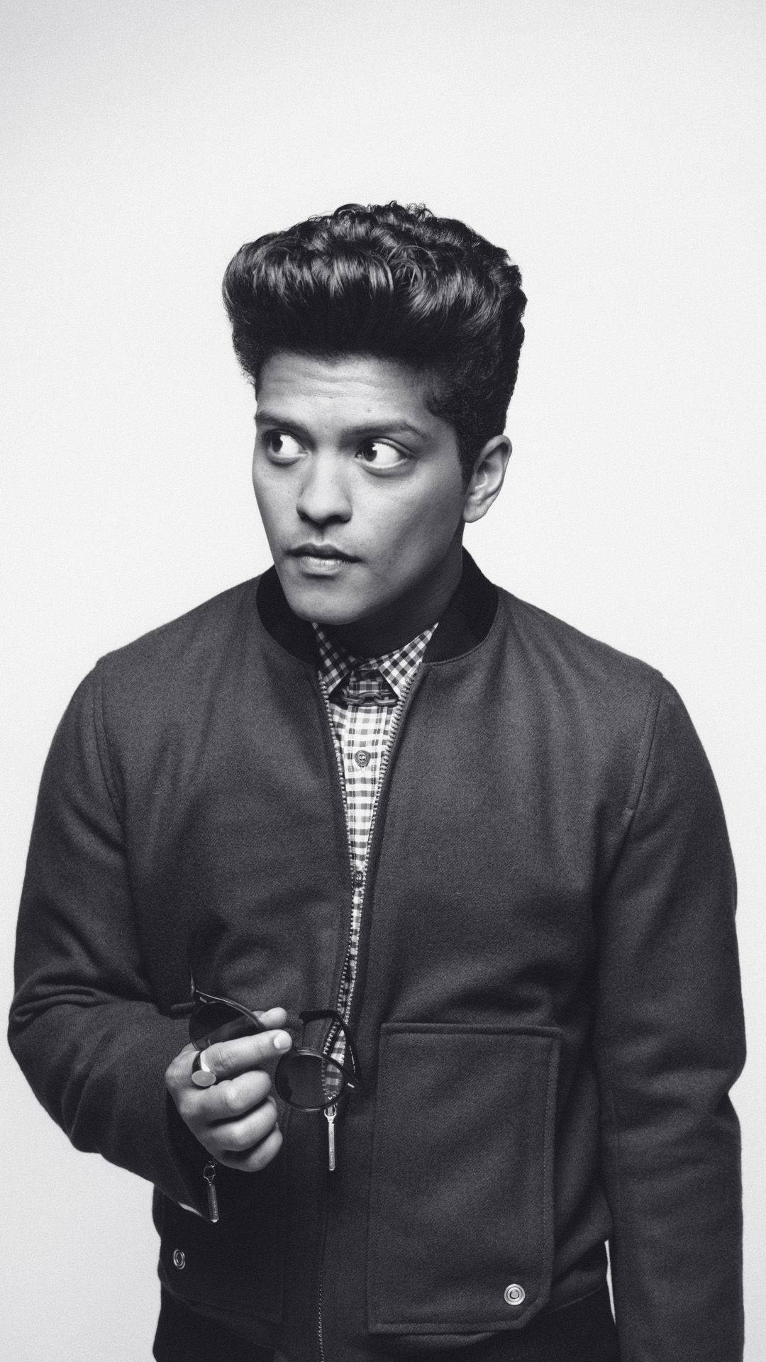 Bruno Mars Perfectly Poses For A Chic Portrait Background
