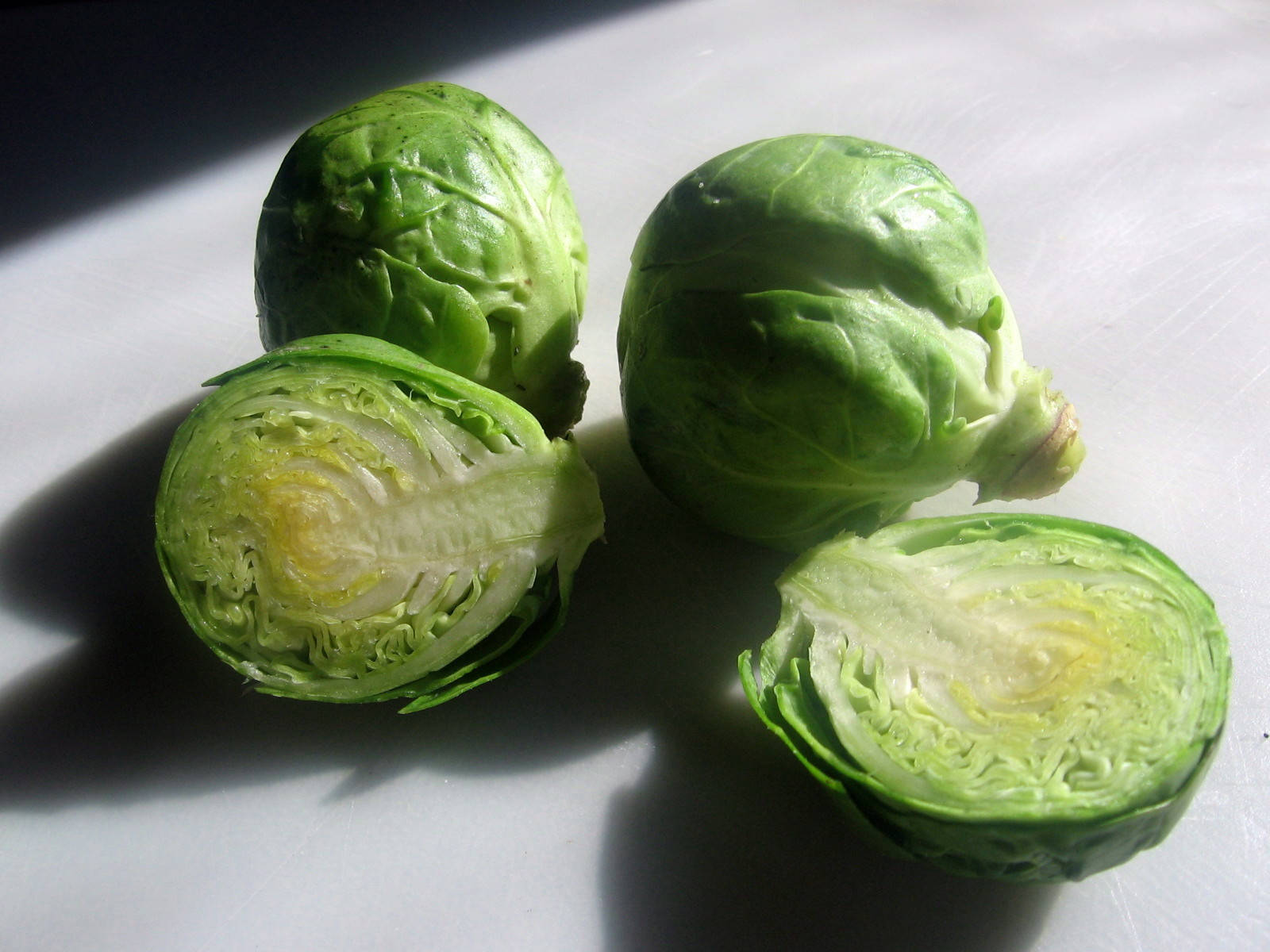 Brussels Sprouts Atop A Marble Platform Background