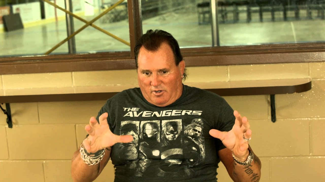 Brutus Beefcake Avengers Shirt Gesture Background