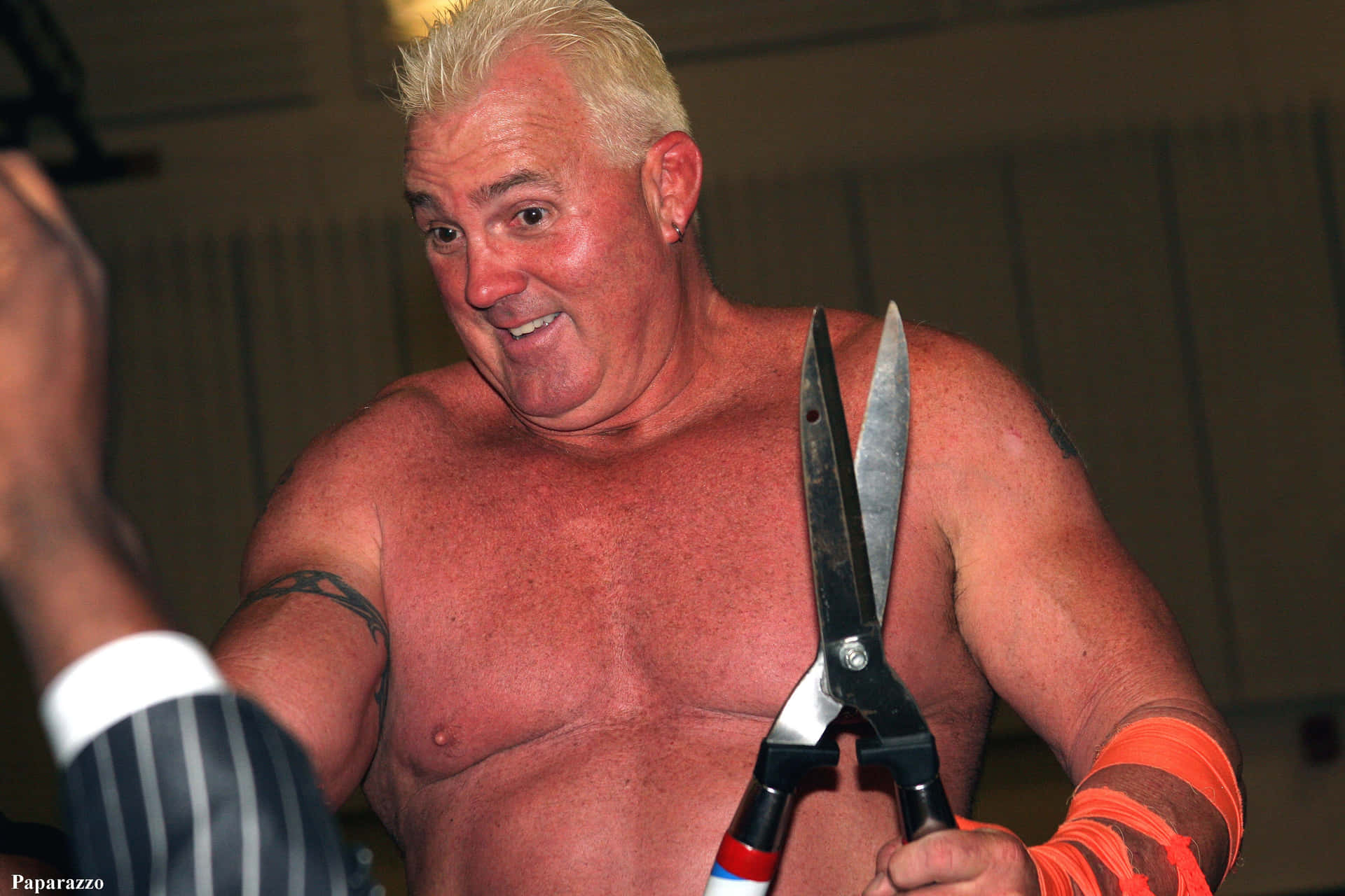Brutus Beefcake Holding His Huge Scissors