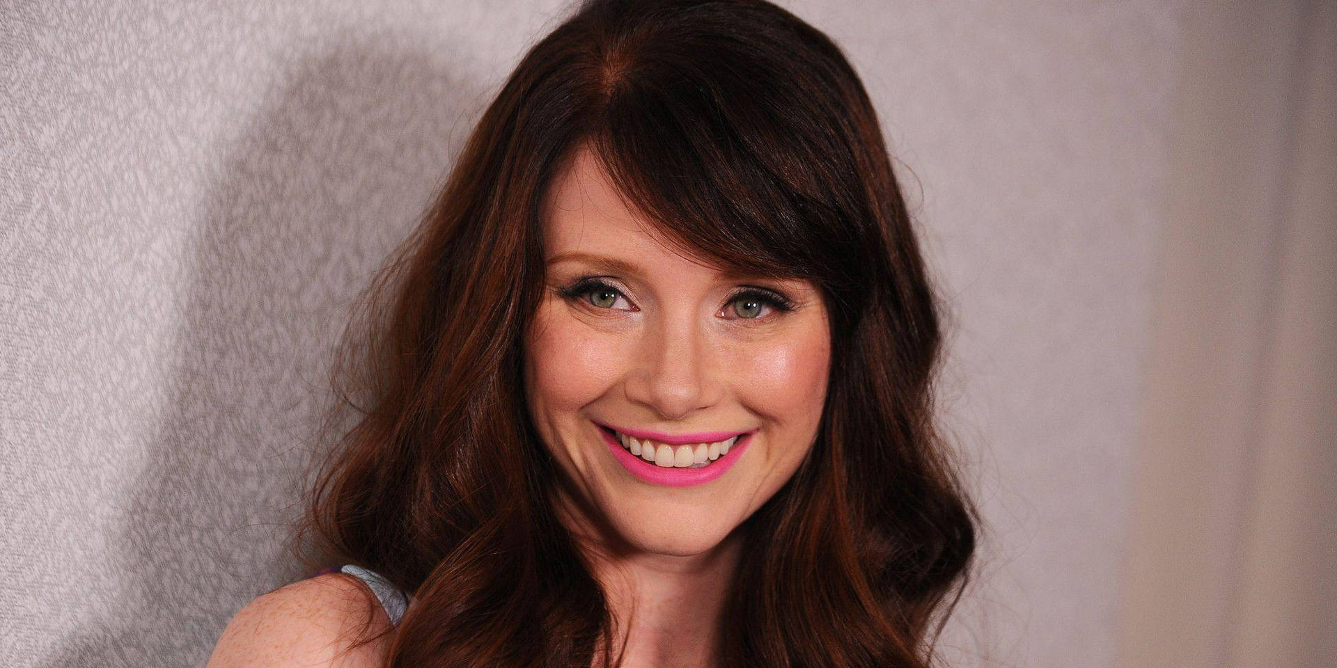 Bryce Dallas Howard Smiling On White Background Background