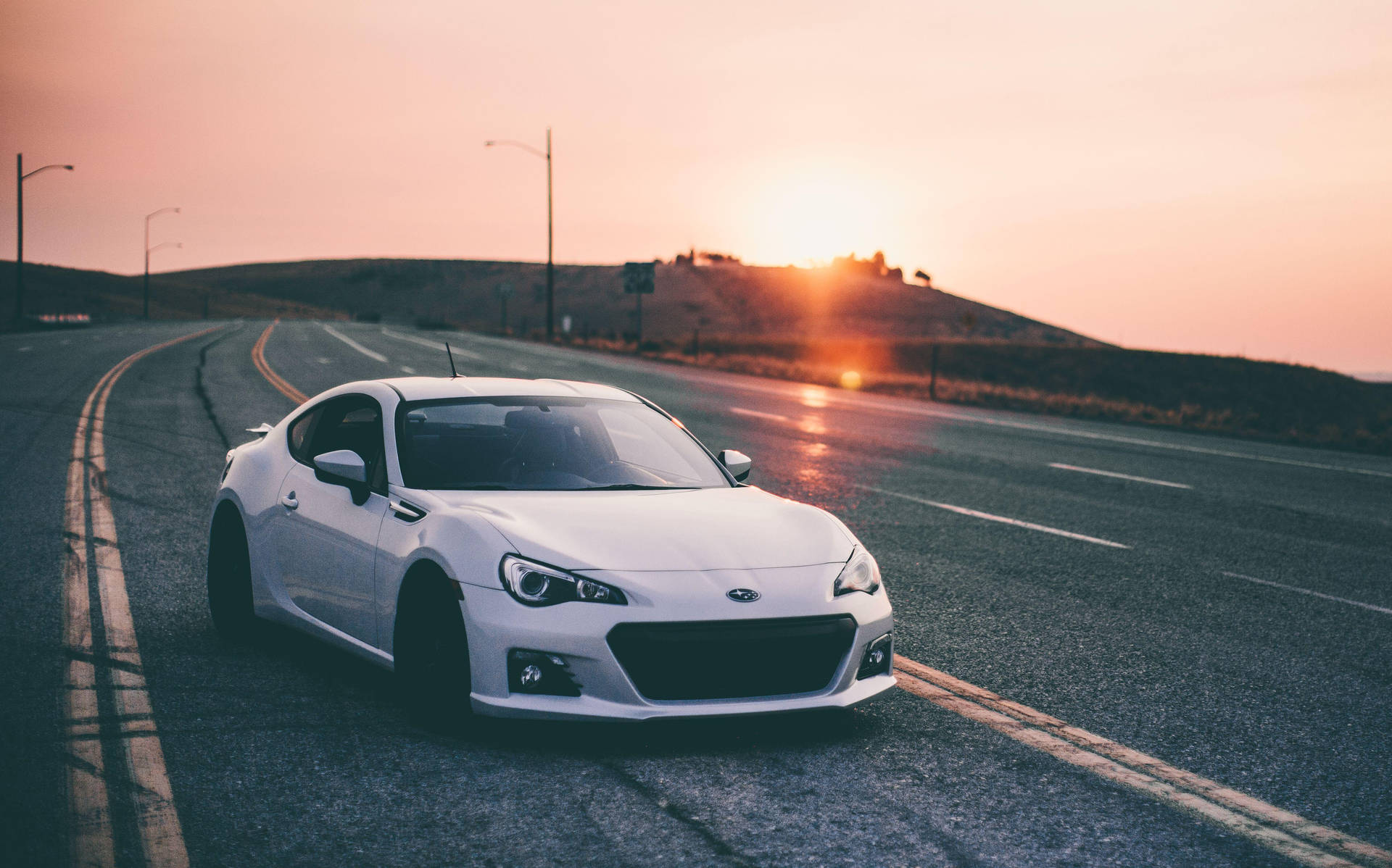 Brz Driving On Sunset Background