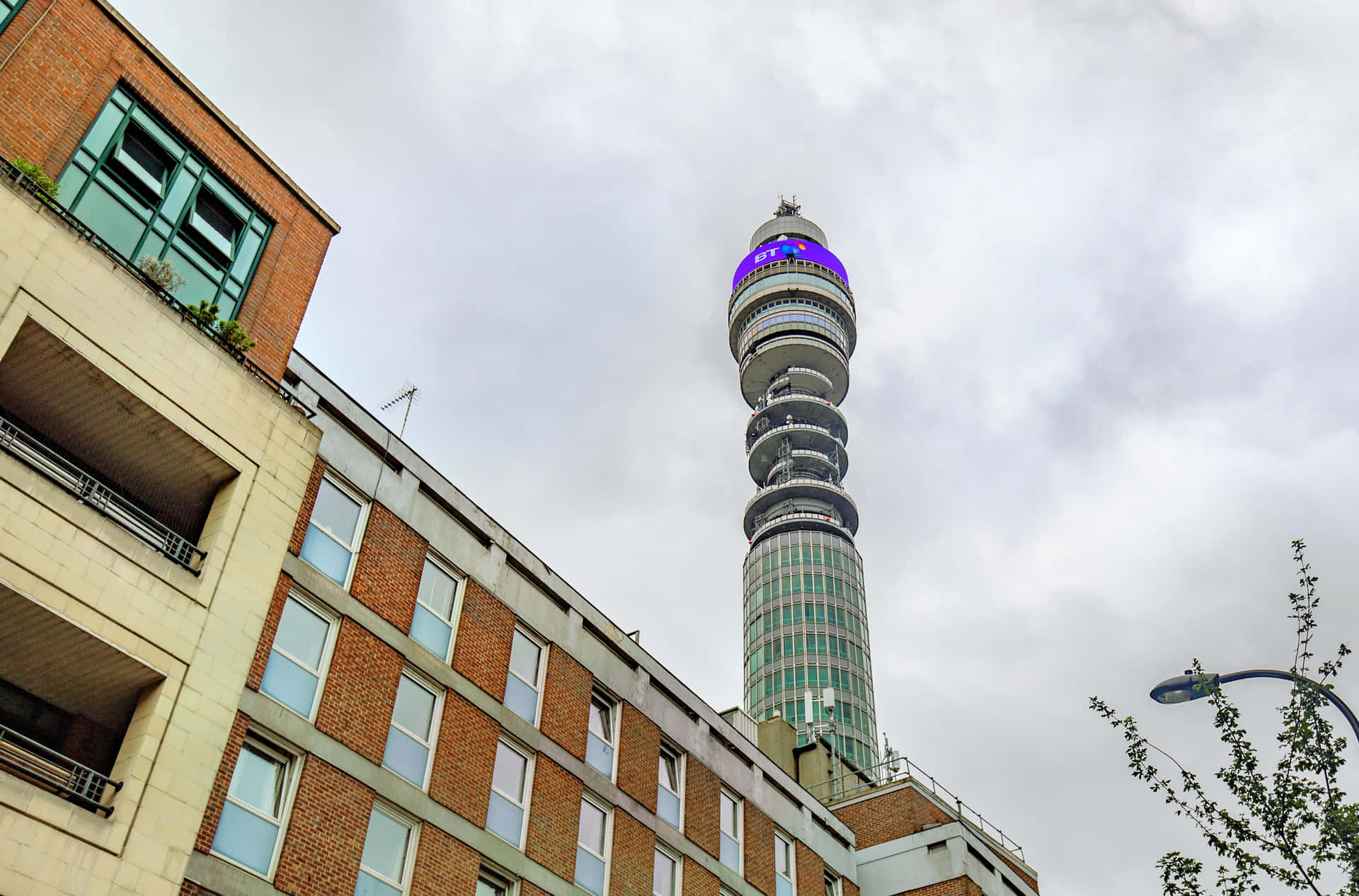 Bt Tower Beneath The Cloudy Sky Background