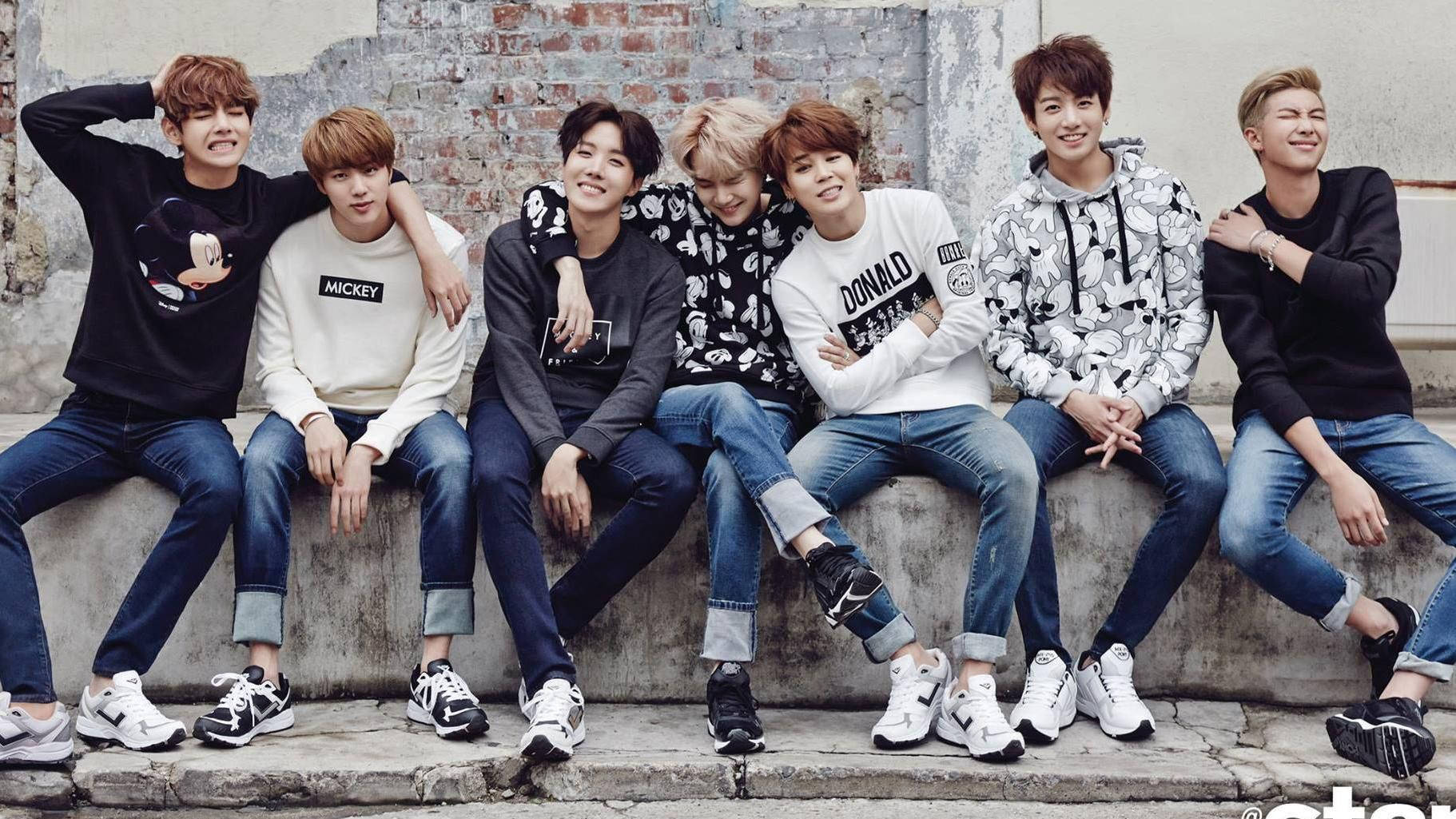 Bts 2020 Seated On Concrete Bench Background