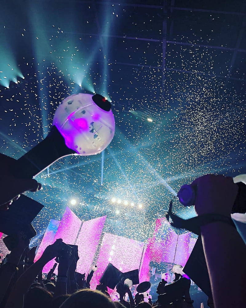 Bts Concert With A Purple Army Bomb Background