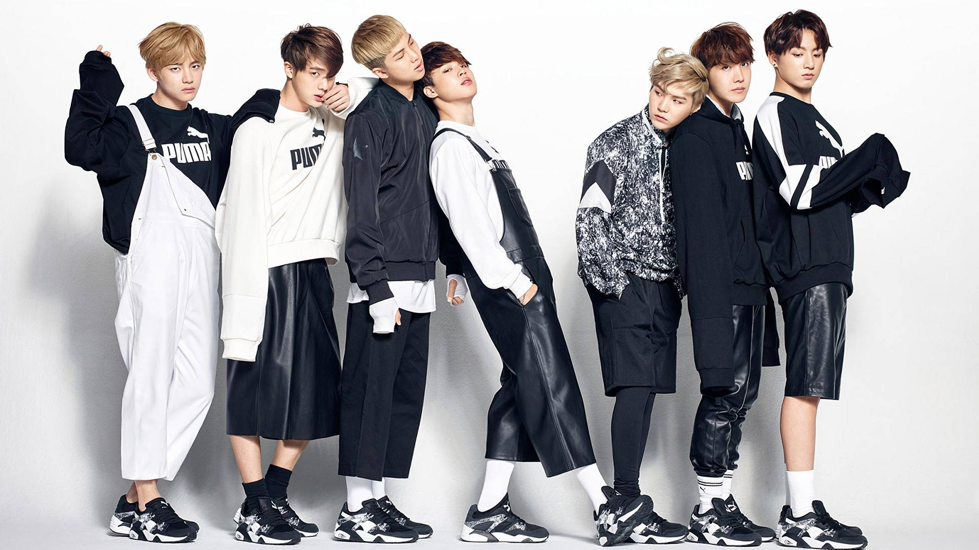 Bts Group Aesthetic In Puma Clothing Background