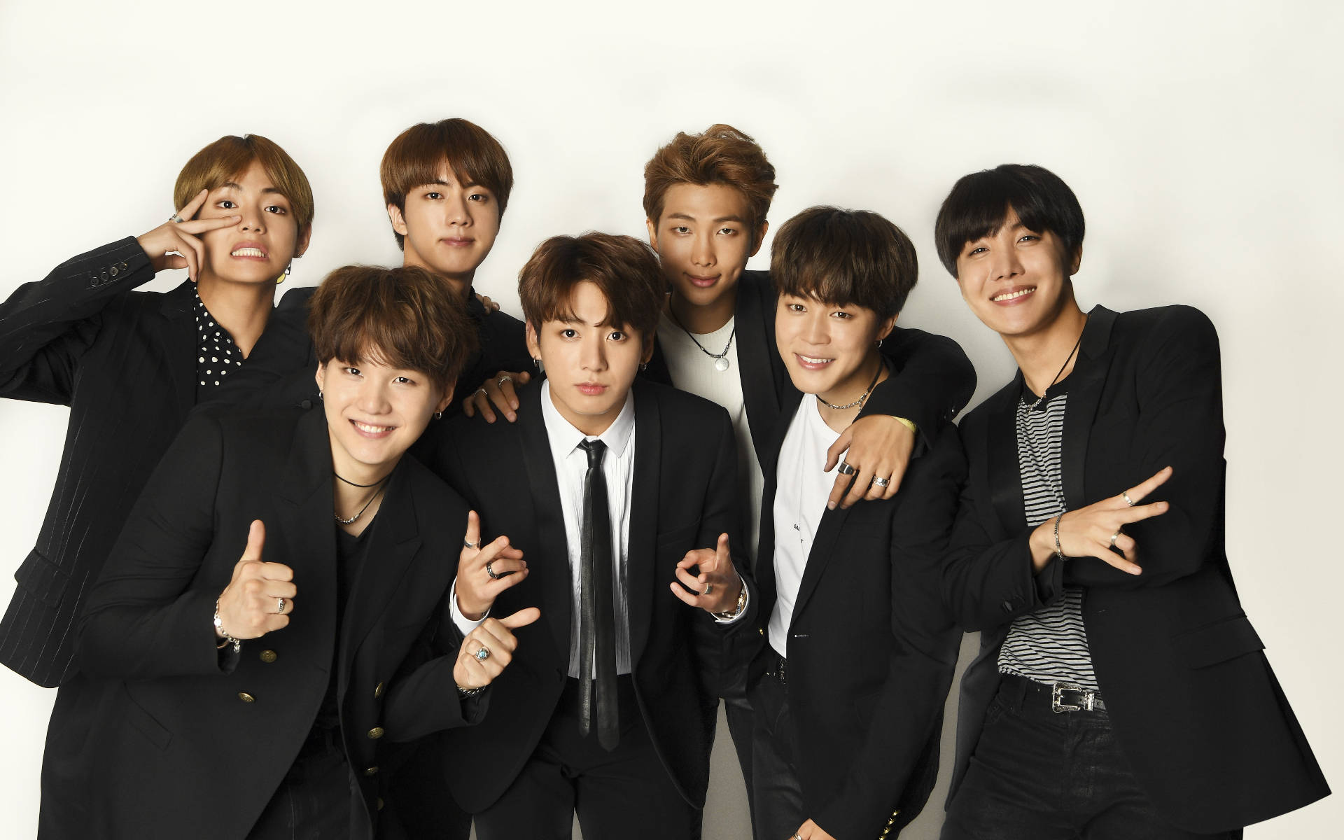 Bts Group Photo In Black Suits Background