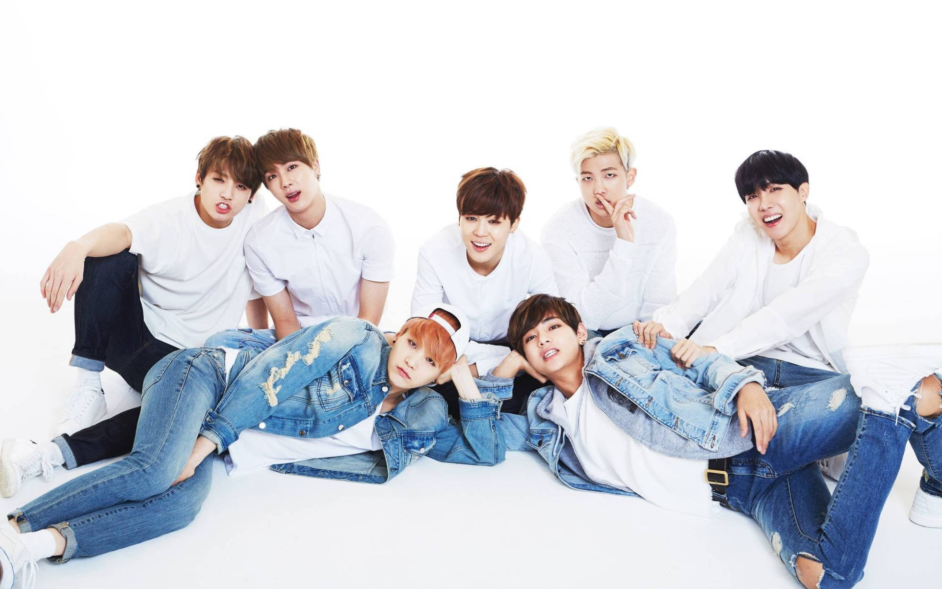 Bts Group Photo In Jeans Background