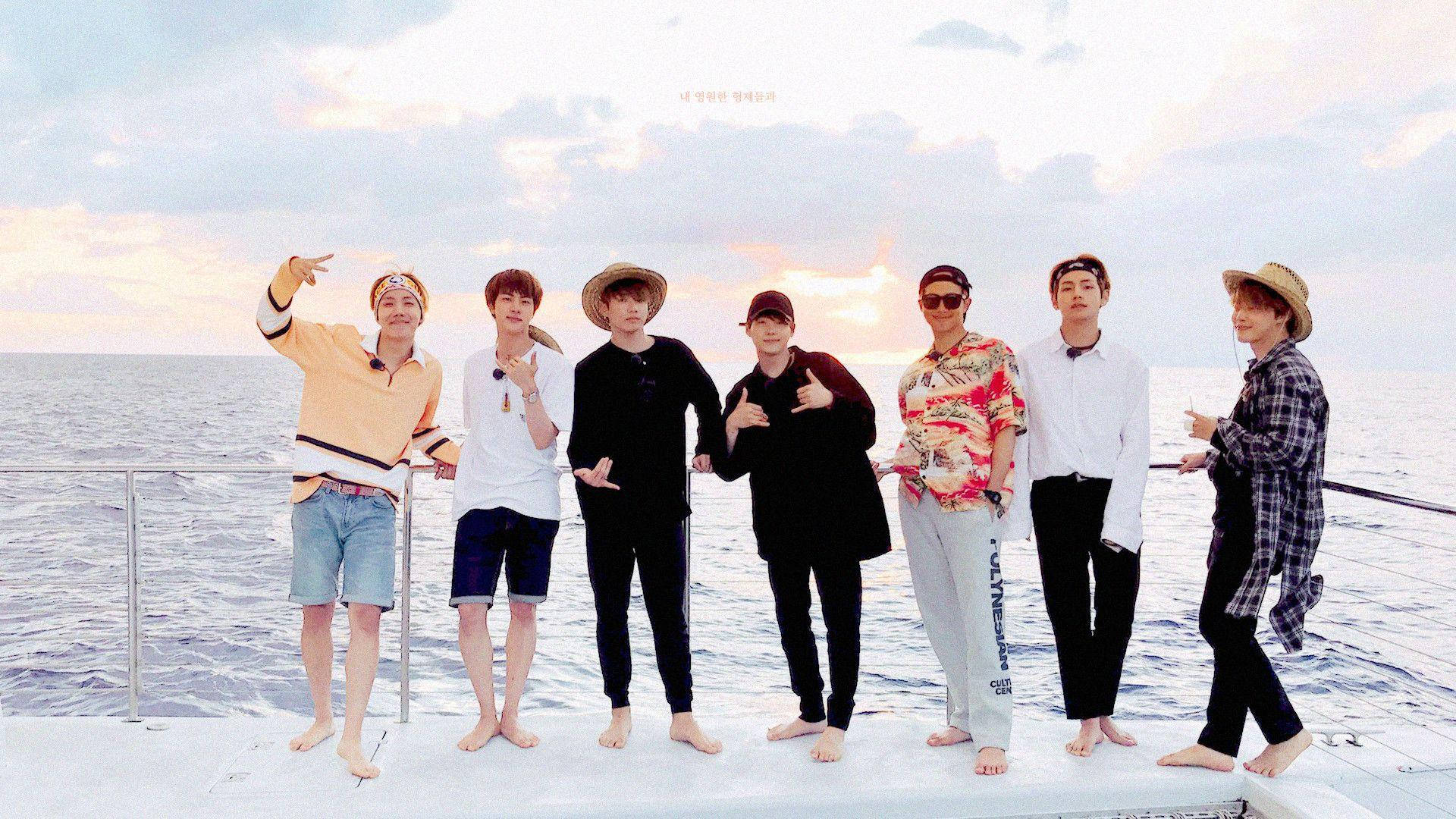 Bts Group Photo On A Yacht Background