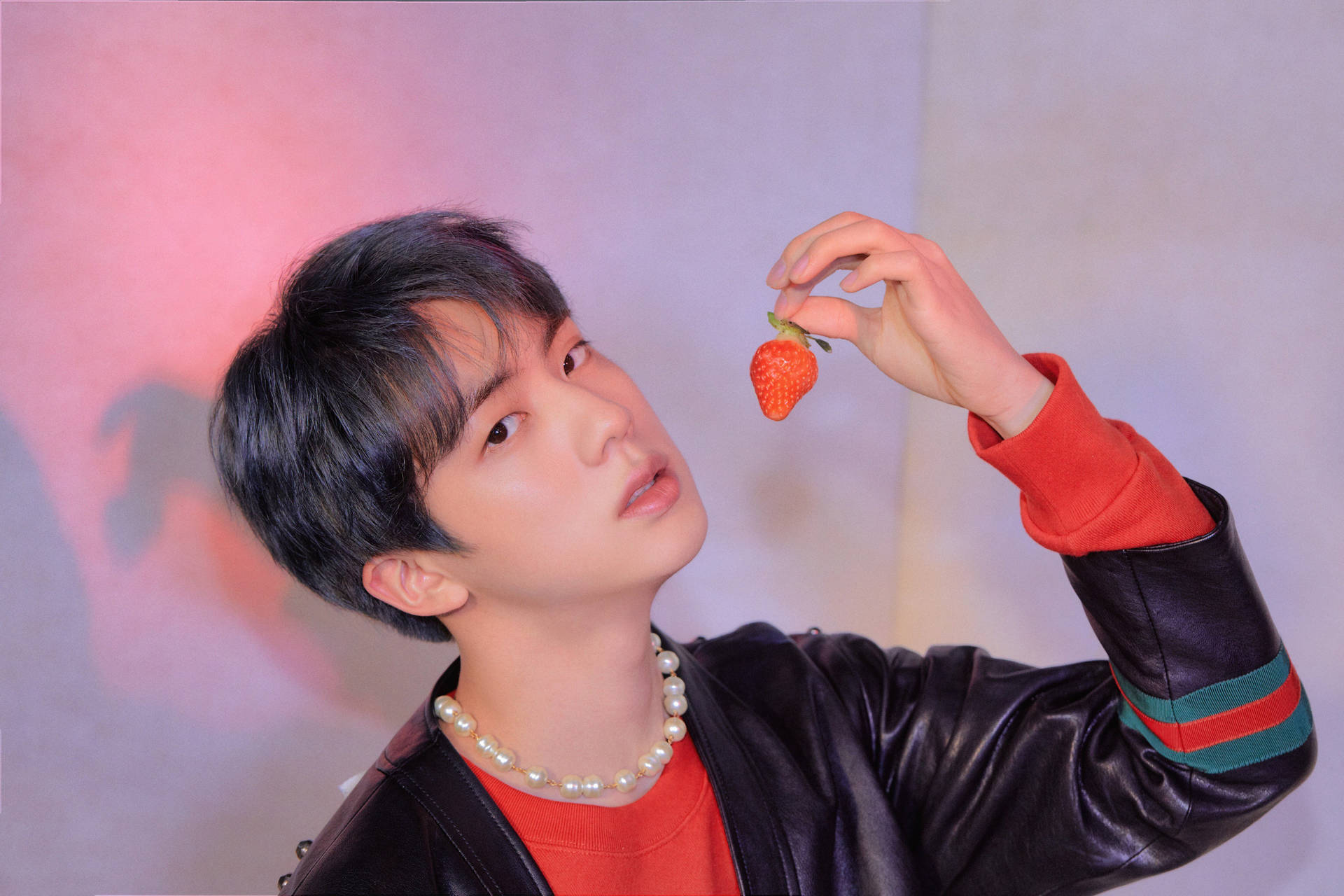 Bts Jin Holding Strawberry Background