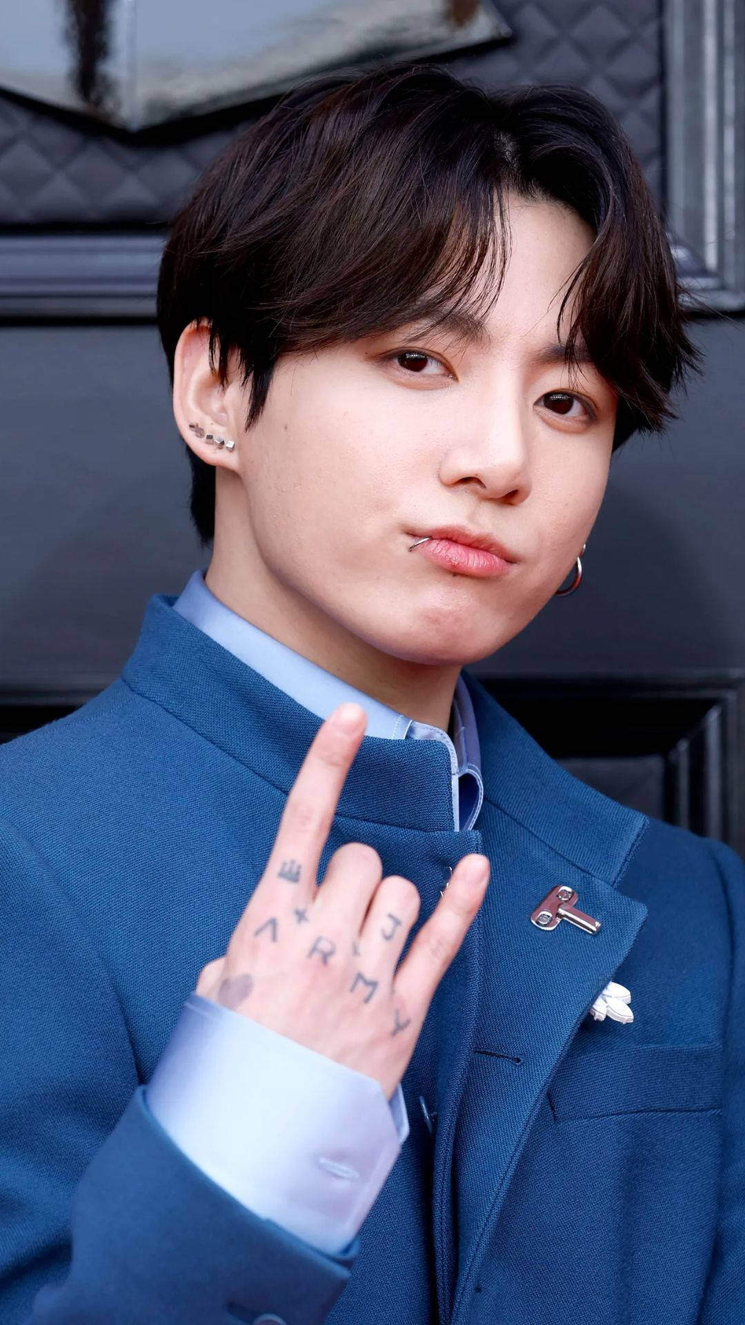 Bts Jung Kook Rock And Roll Sign Background