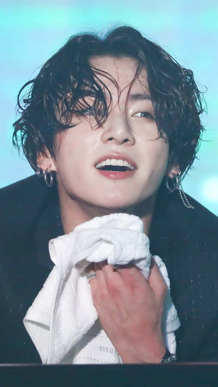 Bts' Jungkook Looks Confident With His Long Locks Background
