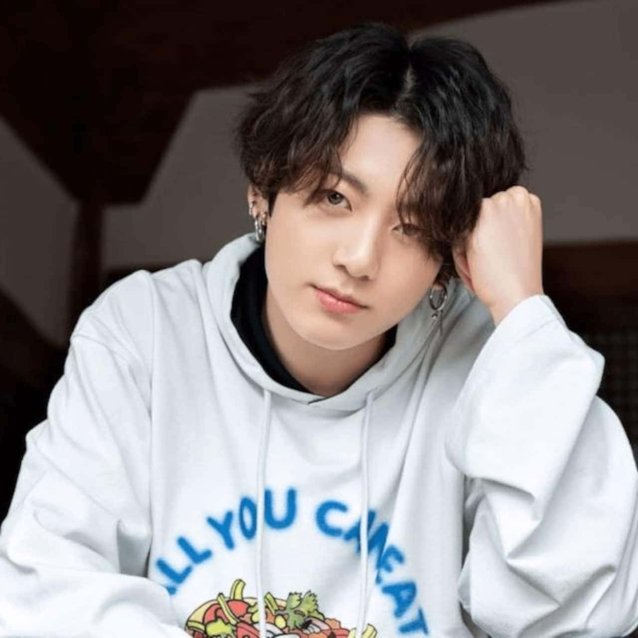 Bts Jungkook Showing Off Signature Long Locks Background
