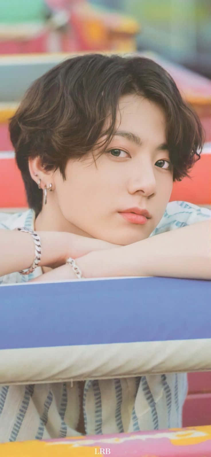 Bts Member Jungkook Sporting Long Hair. Background
