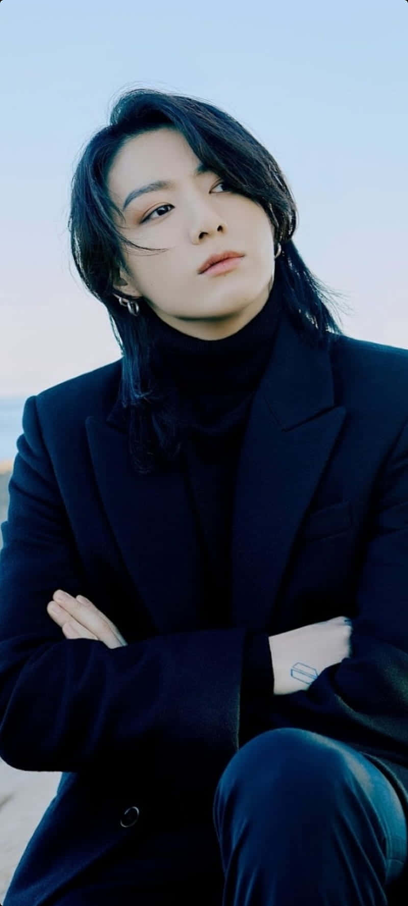 Bts Member Jungkook With Amazingly Long And Beautiful Hair. Background