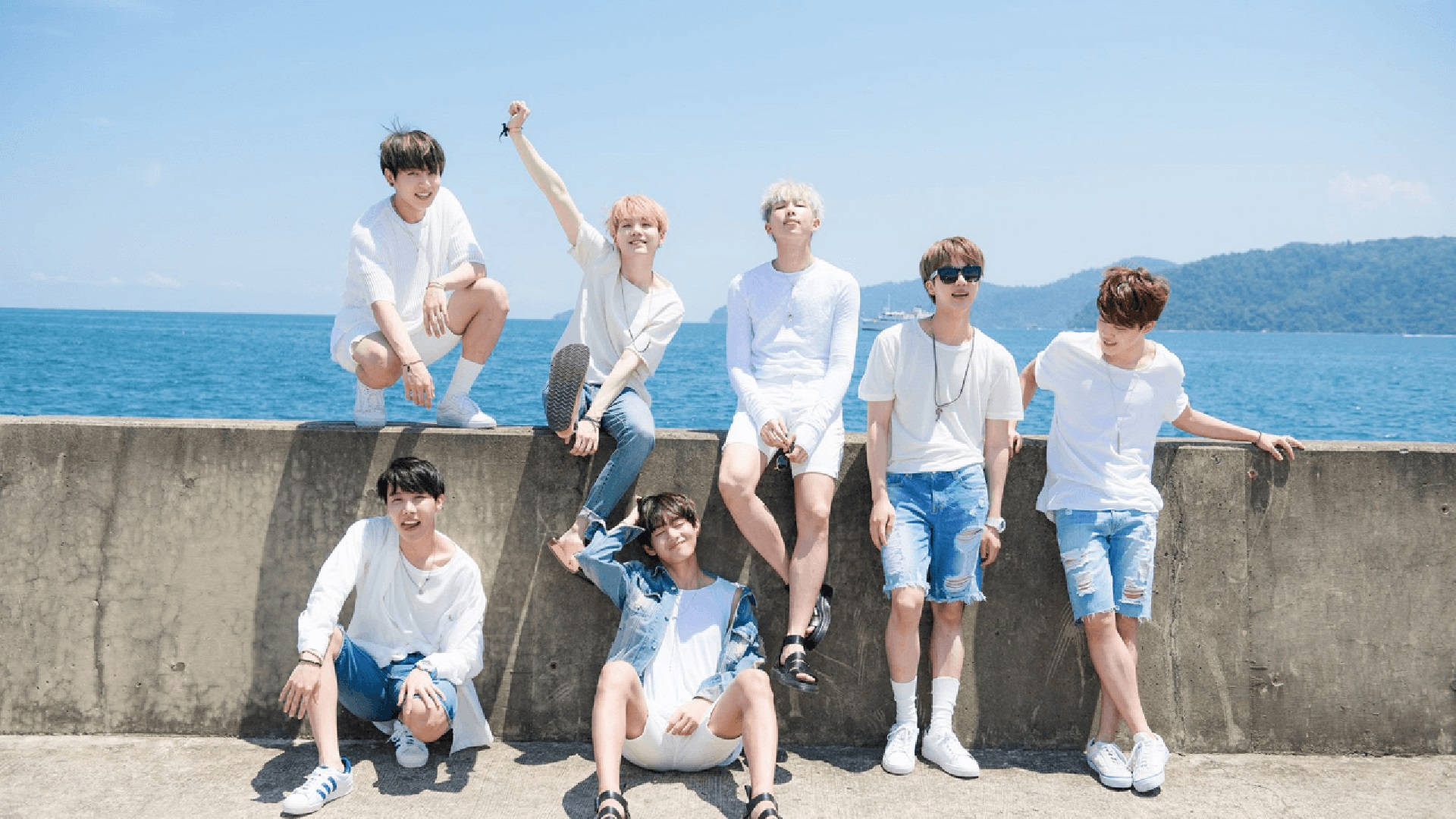 Bts Posing By Sea Background