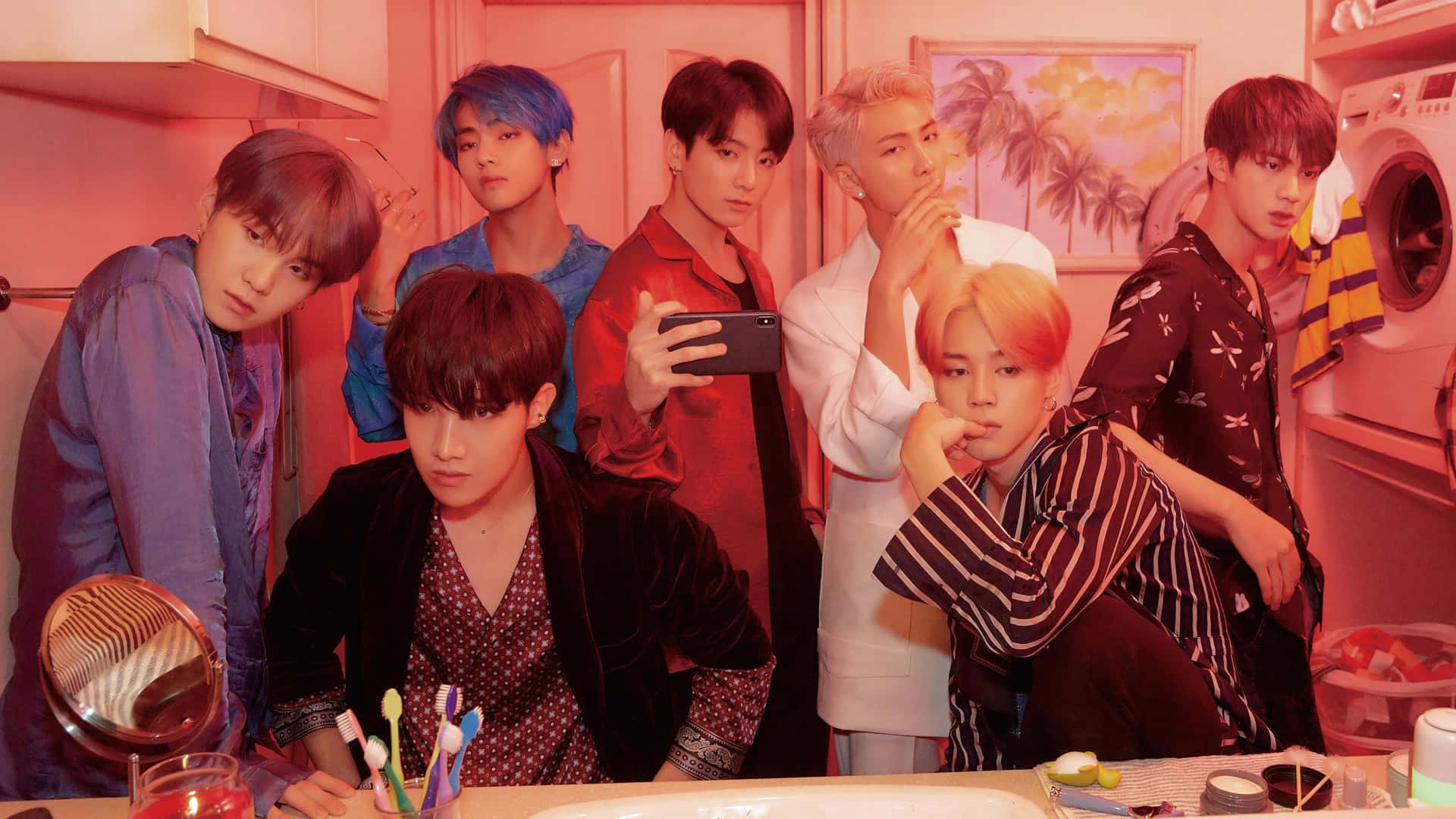 Bts Showing Off Their Mac Laptops For Power And Performance Background