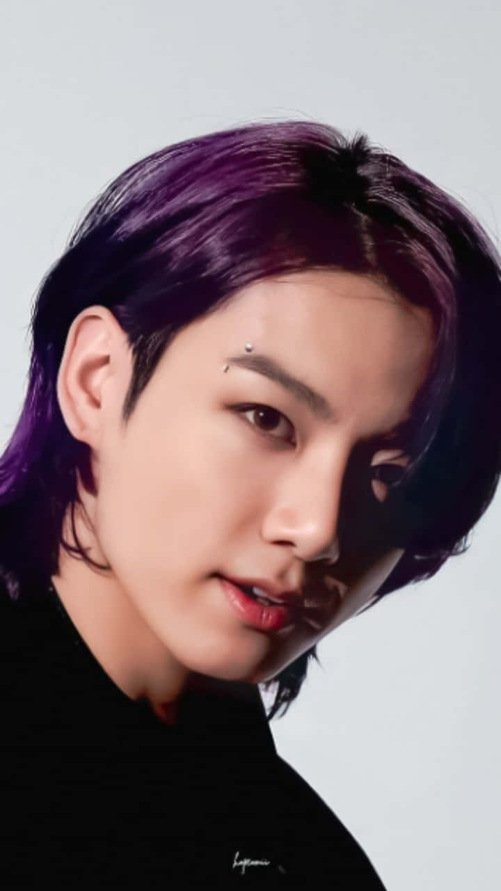 Bts Singer Jungkook Sporting His Trendy Long Locks At A Live Show Background