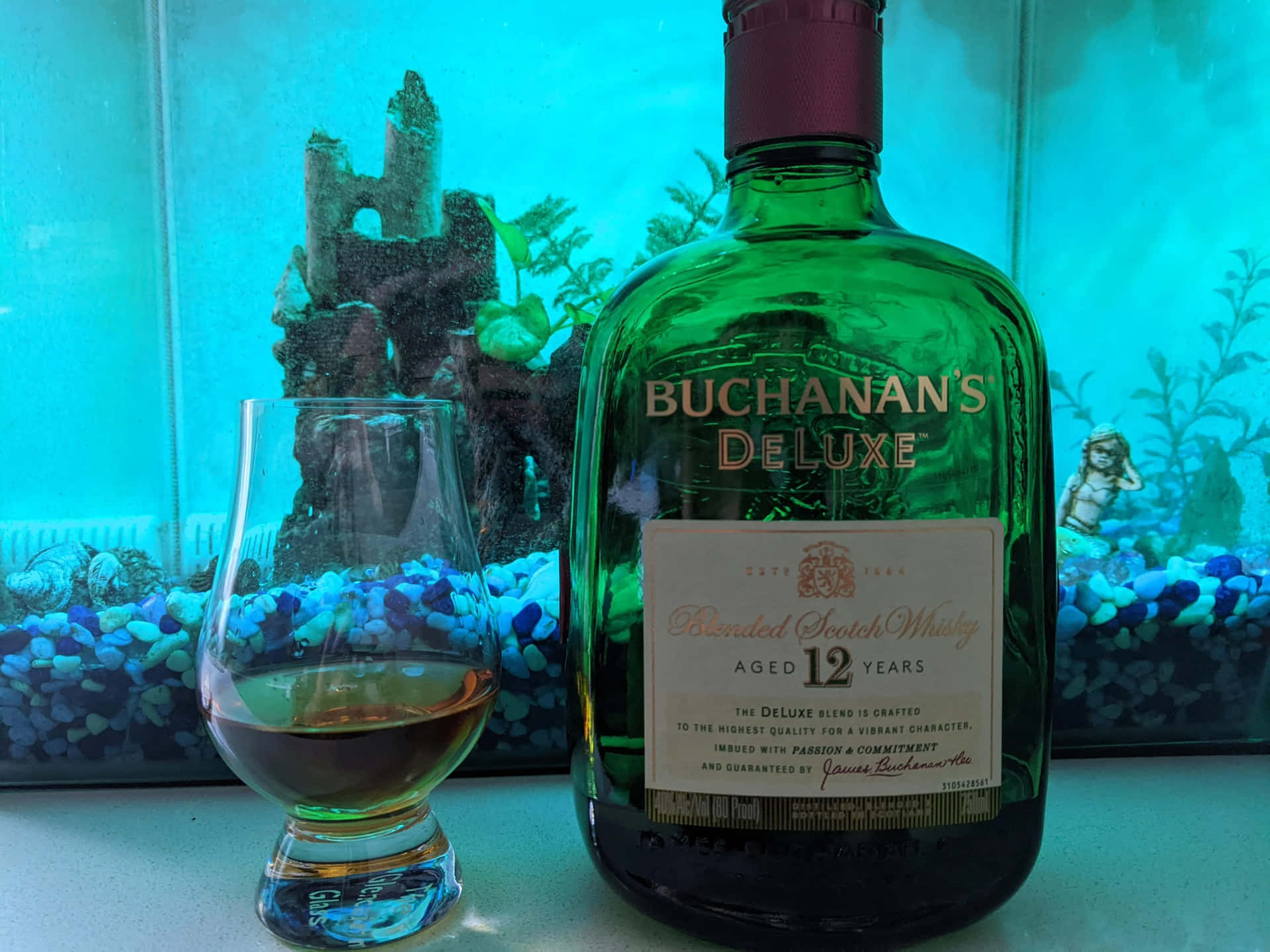 Buchanan's Deluxe Whiskey In Glass Background