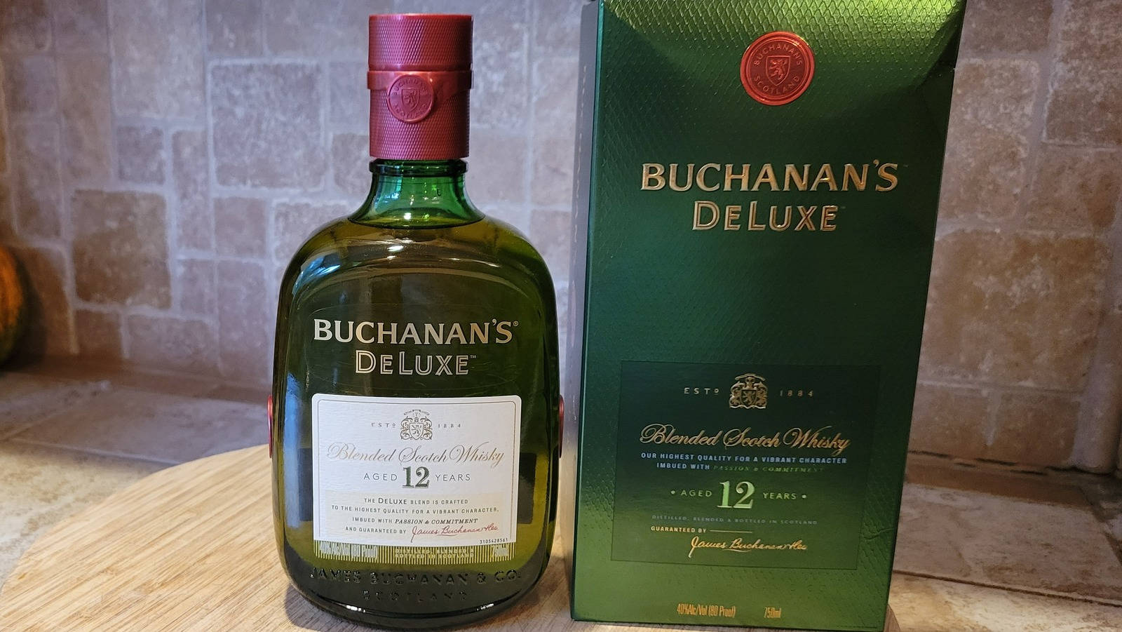 Buchanan's Deluxe Whiskey With Packaging Background