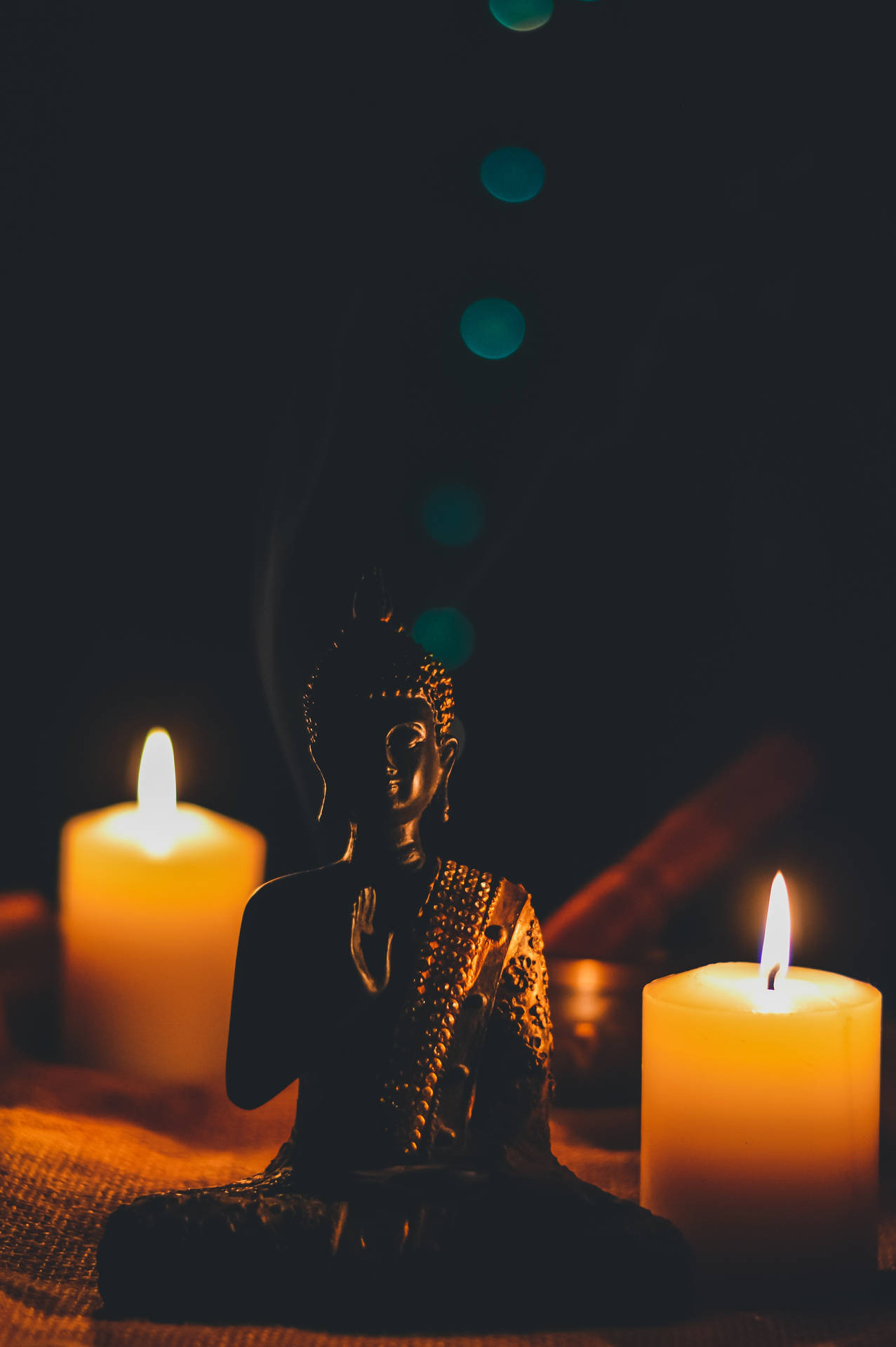 Buddha And Lighted Candles Background