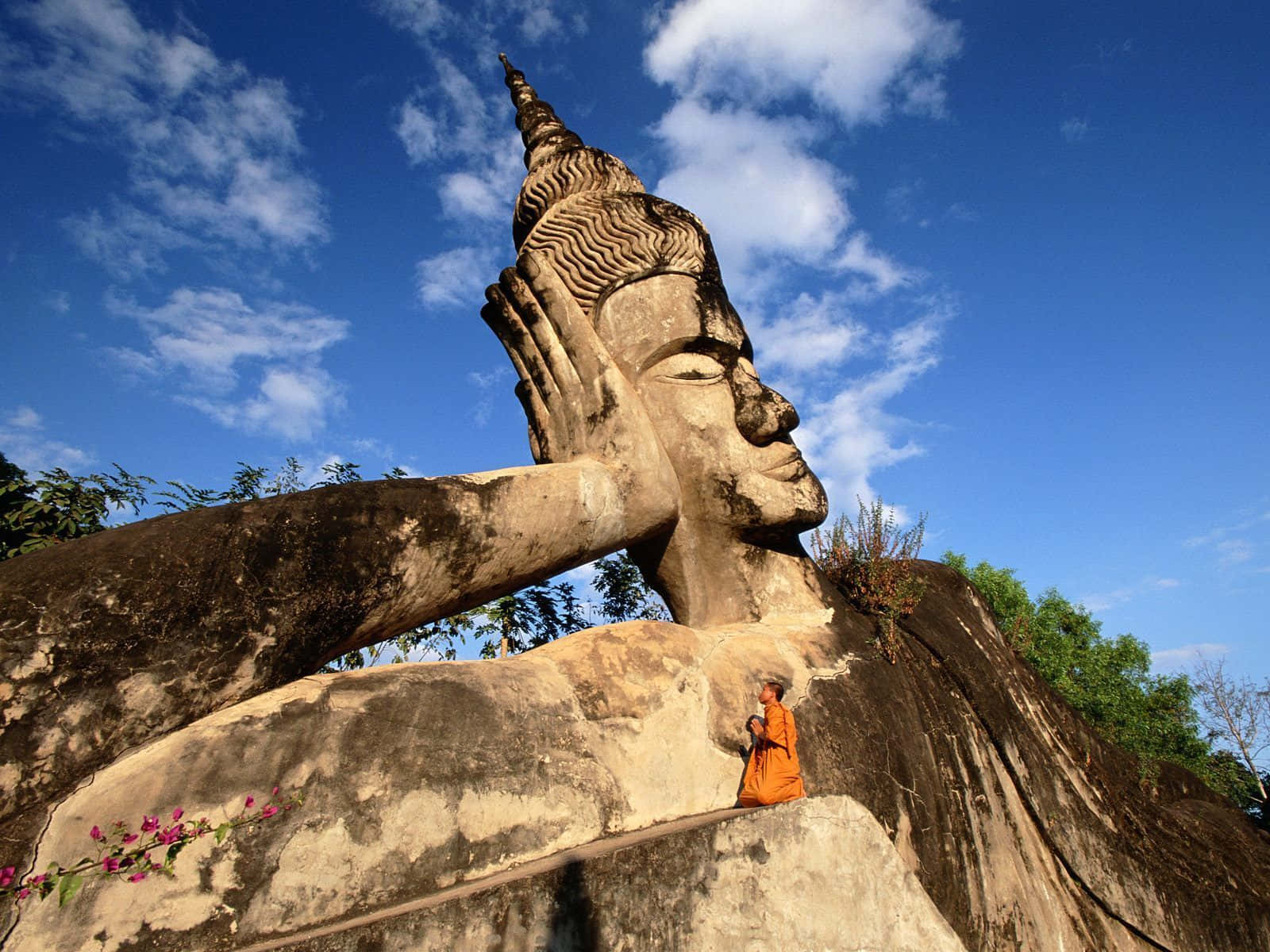 Buddha Park Statue In Vientiane Background