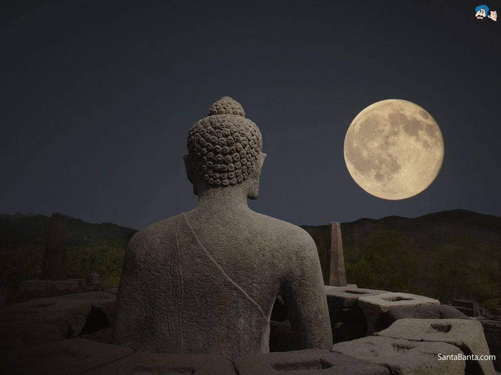 Buddha Statue Under Moon Background